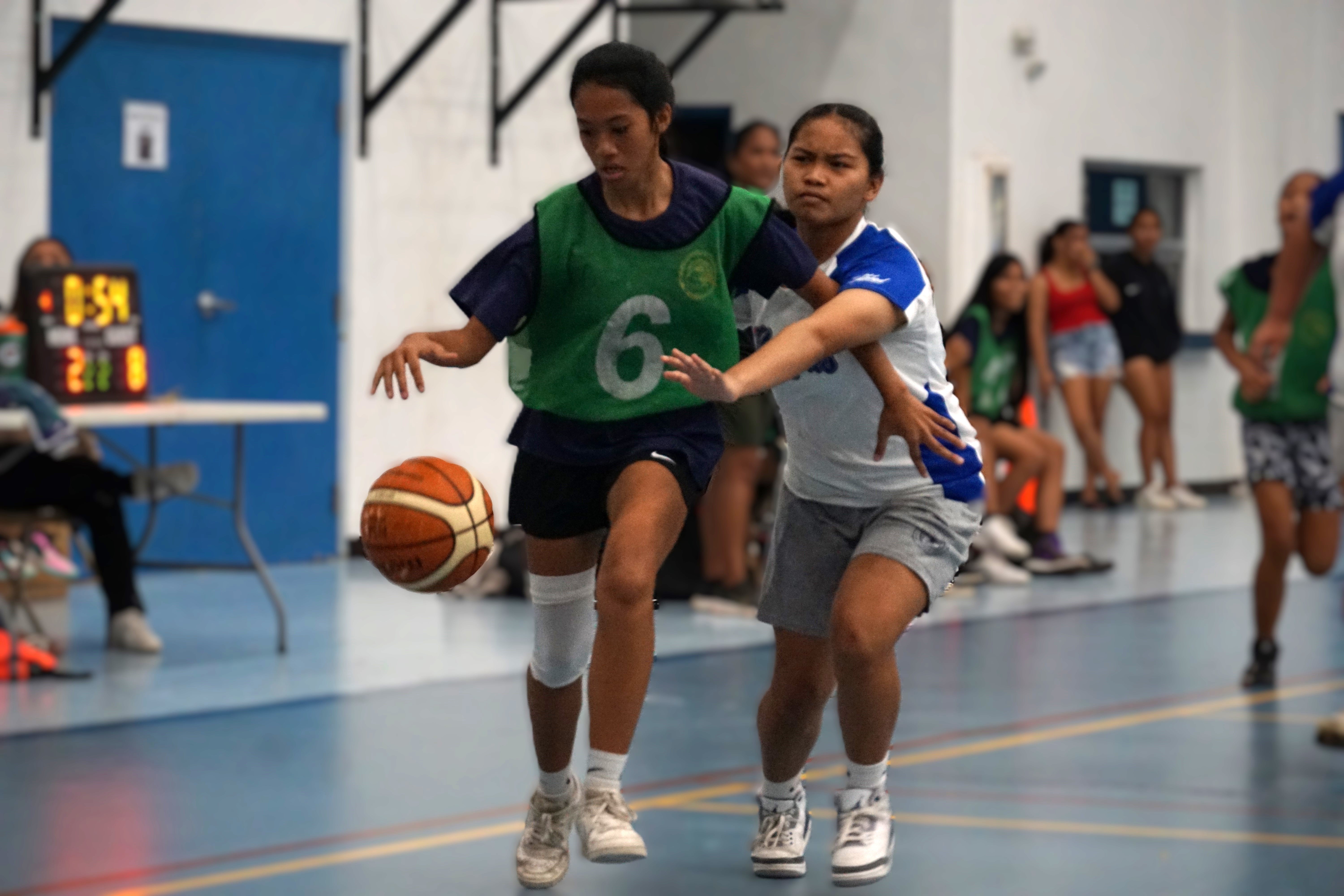 Hopwood’s Jayla Ayuyu protects the ball as an MCS defender reaches for the steal during a girls middle school division game of the IT&E Interscholastic Basketball League SY23-24 at the MHS gym on Wednesday.