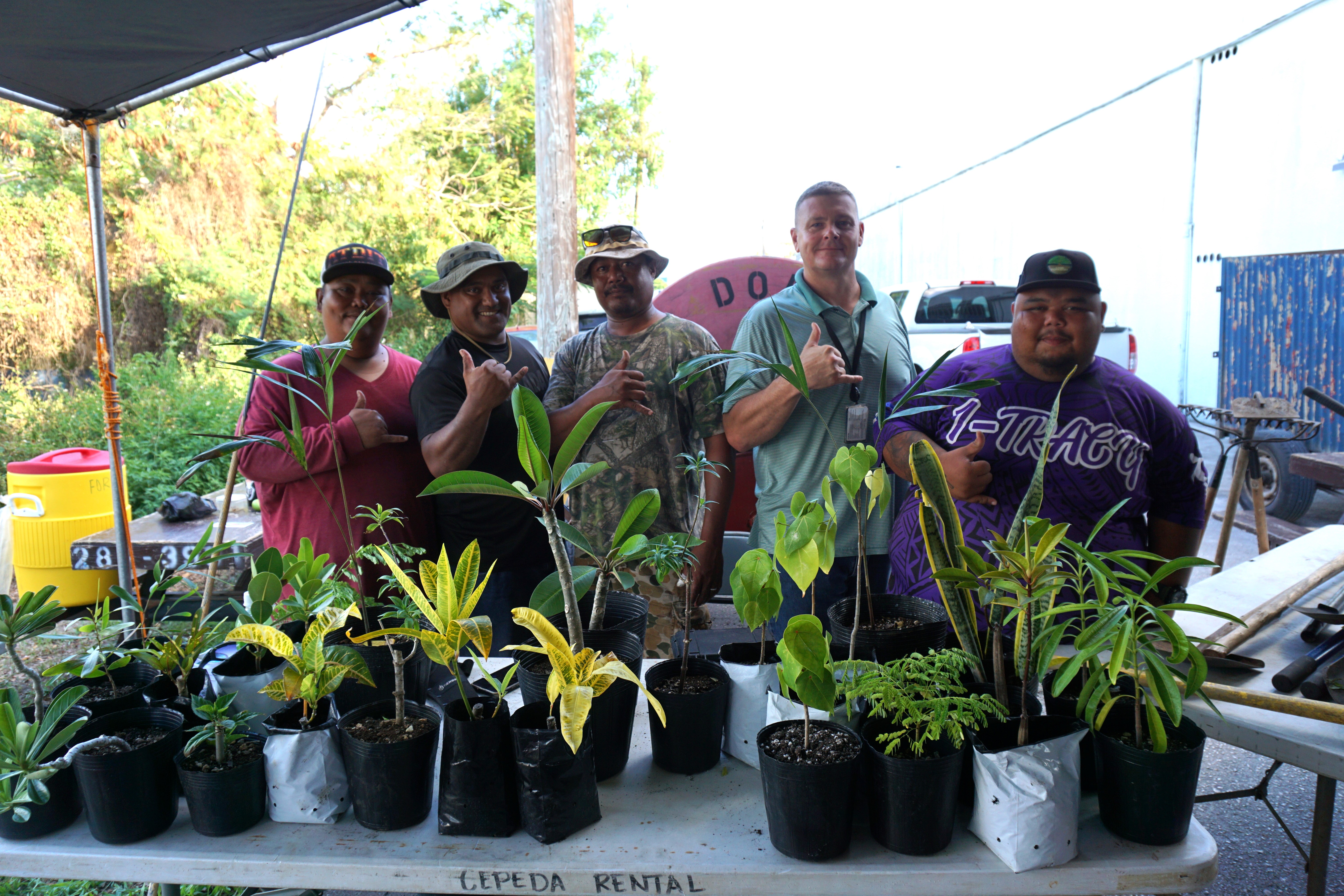Pedro Tudela, David Combs and their CNMI Forestry coworkers conduct a public outreach at the Earth Day Mini Night Market​.