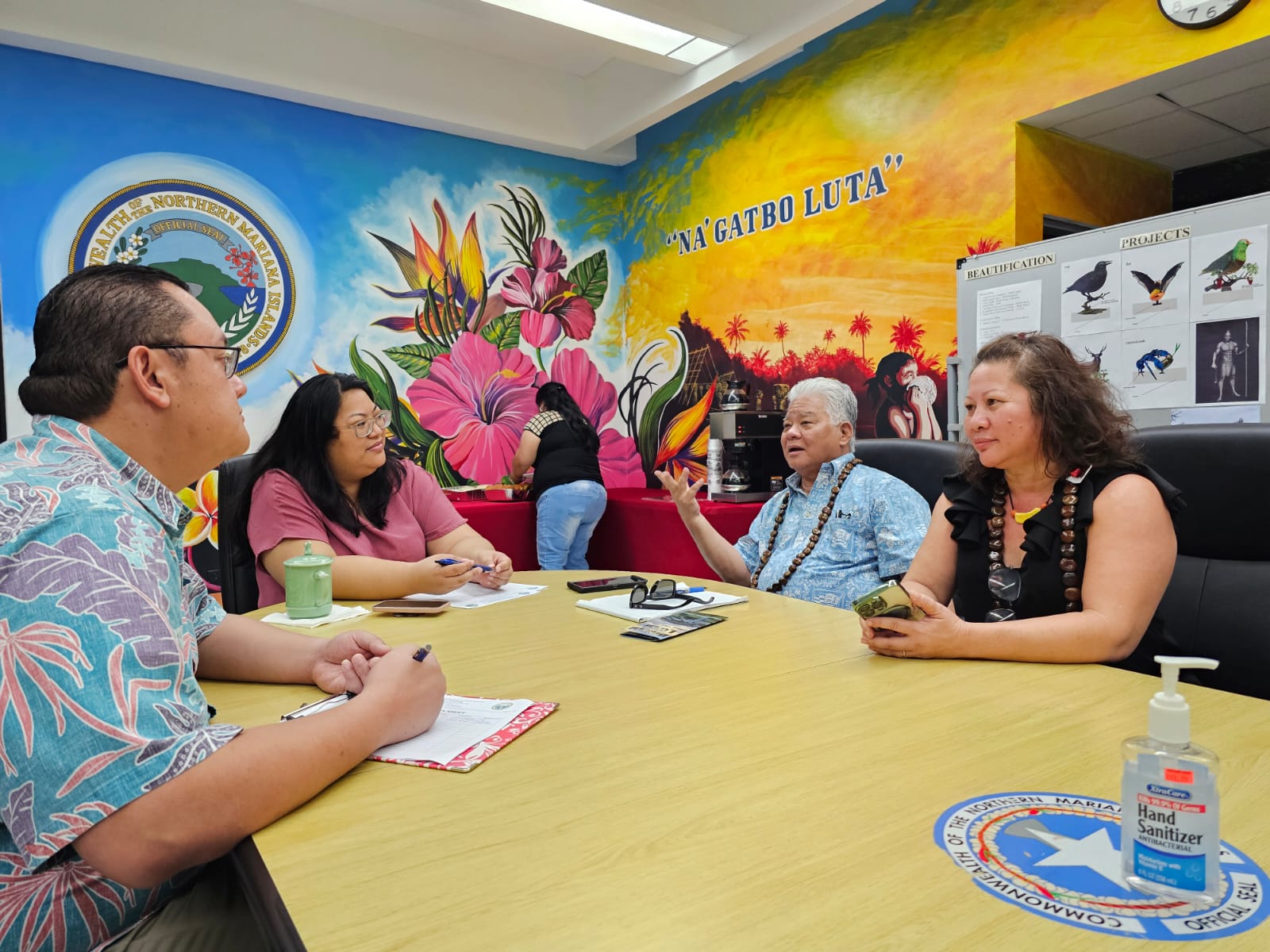 Gov. Arnold I. Palacios, second right, gestures as he speaks while Rota Mayor Aubry Hocog, second left, Senate Vice President Donald Manglona, left, and Rep. Julie Marie Ogo listen during a meeting at the Rota Mayor's Office on Wednesday last week.