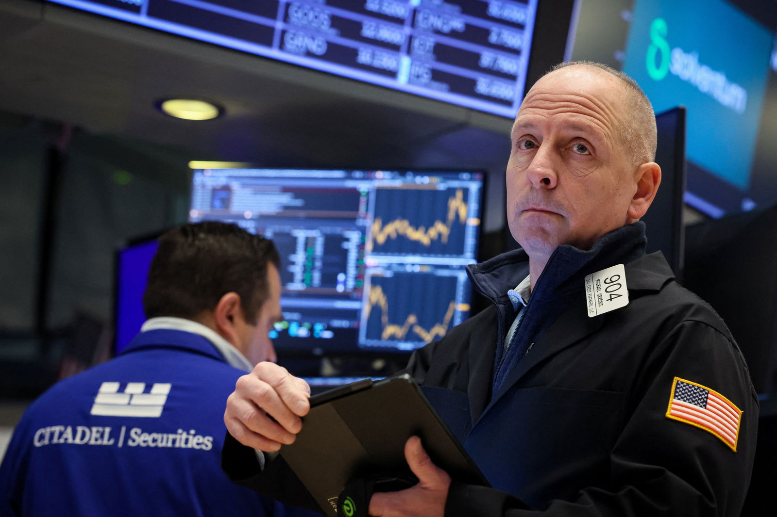 Traders work on the floor of the New York Stock Exchange in New York City, April 1, 2024.