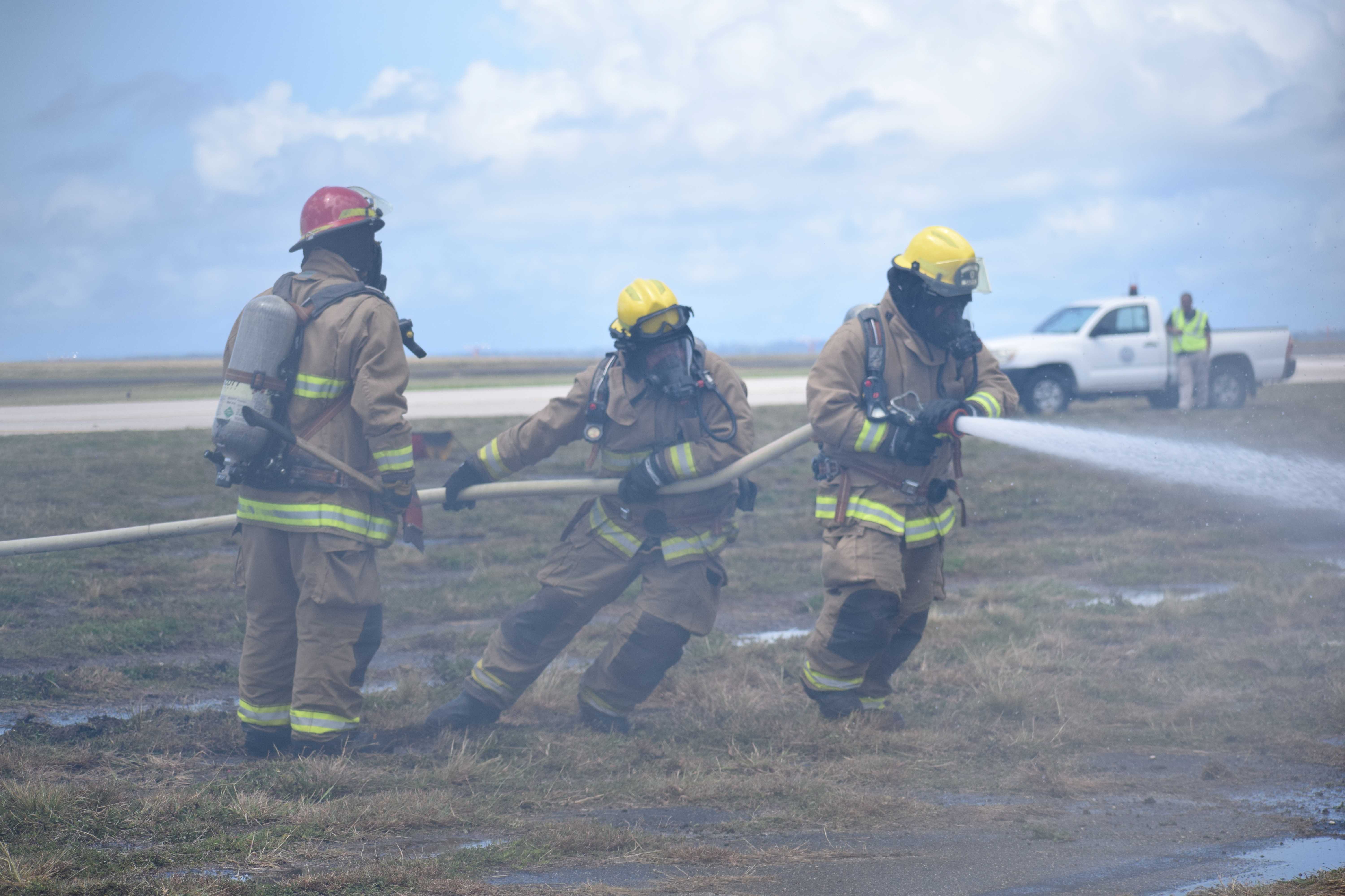 ARFF firefighters extinguish the fire.