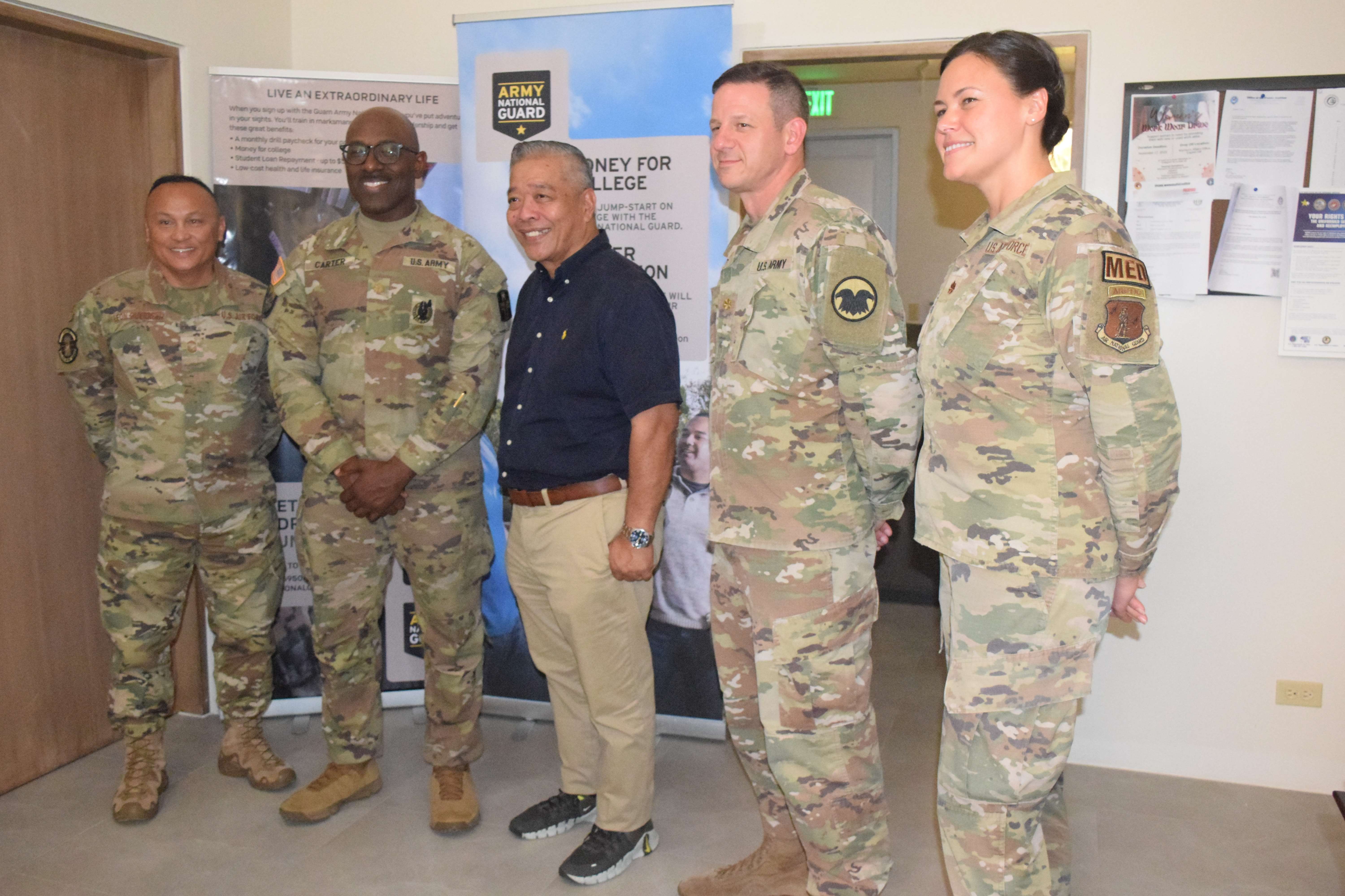 Innovative Readiness Training program manager Maj. Daniel LaVorgna, second right, and Special Assistant for Military Affairs Daniel Aquino, center, pose for a photo with Guam Air National Guard SMSgt Joseph Leon Guerrero, left, mission planner Maj. Kelvin Cater, second left, and Air National Guard 176th Medical Group Major Jennifer Ward, right, following a press briefing on Thursday at the CNMI Bureau of Military Affairs Office on Capital Hill. 