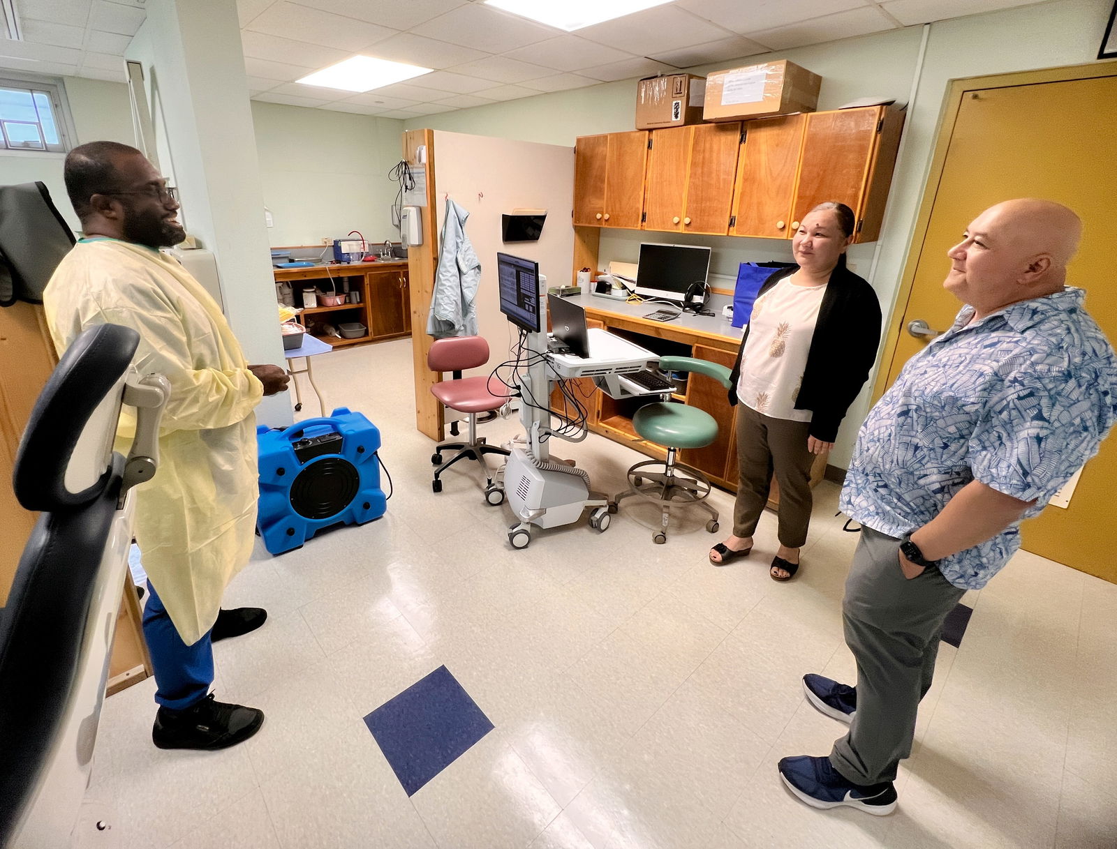 Commissioner of Education Dr. Lawrence F. Camacho is introduced by Rota Health Center Resident Director Vanessa Quitugua to Kitione Vukunisaga, a dental therapist. Resident Director Quitugua told Commissioner Camacho that they are providing free dental services to first, second and sixth graders.