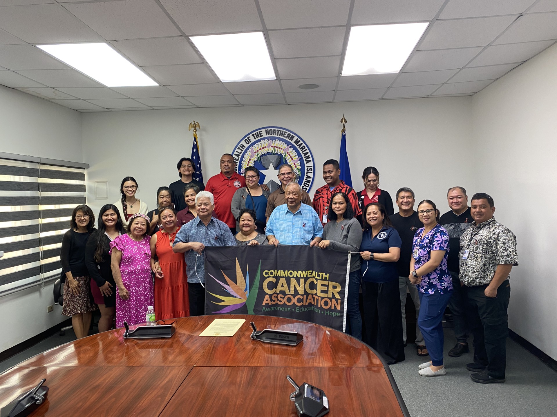 Commonwealth Cancer Association members pose for a photo with Commonwealth Healthcare Corporation officials, Gov. Arnold I. Palacios, Lt. Gov. David M. Apatang, oral cancer survivors, health advocates and other community members during the Oral Cancer Awareness Month proclamation signing ceremony in the governor’s conference room on Wednesday.