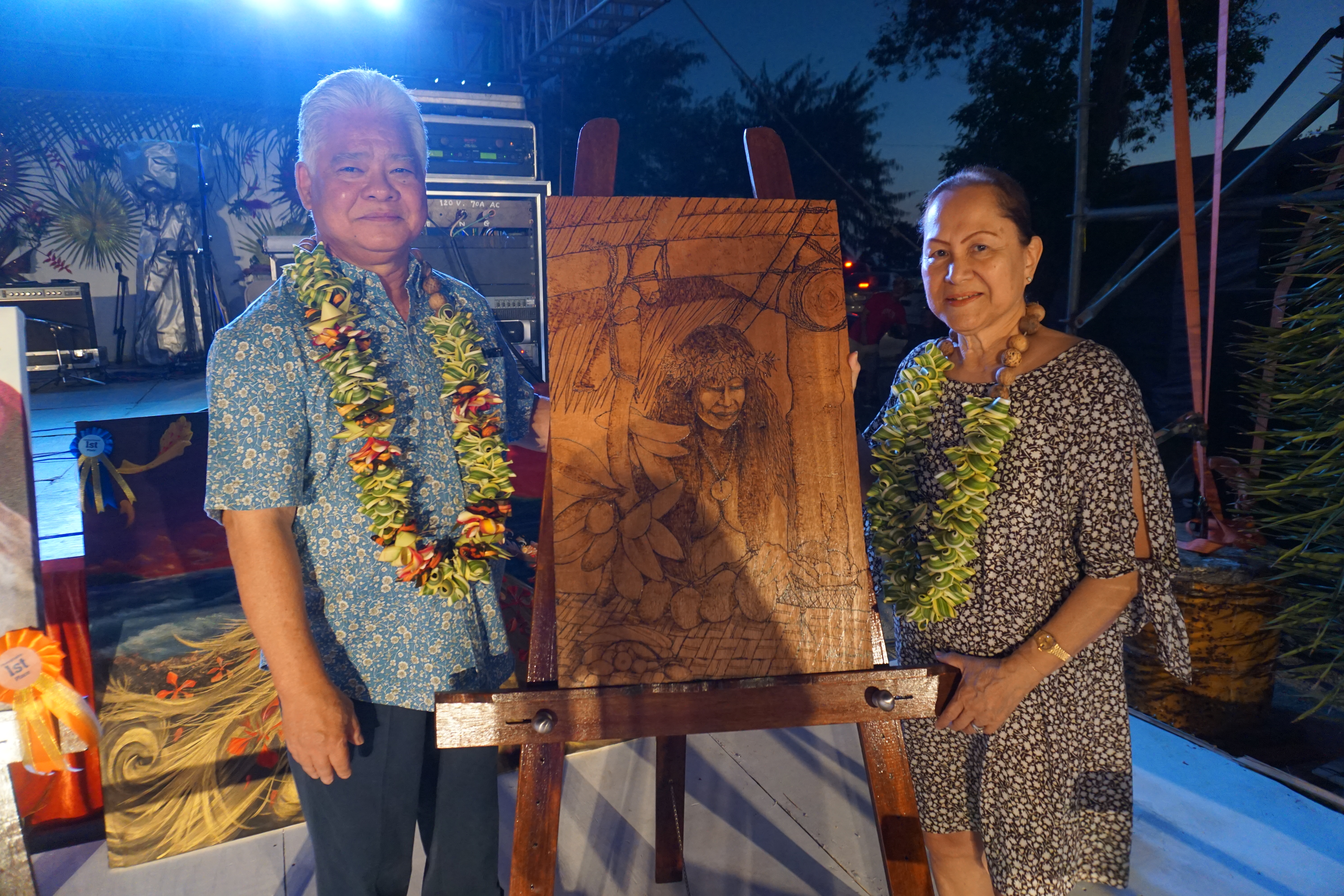 Gov. Arnold I. Palacios and first lady Wella Palacios with the winning entry for the Governor’s Choice Award, “Princess Sosambre.”