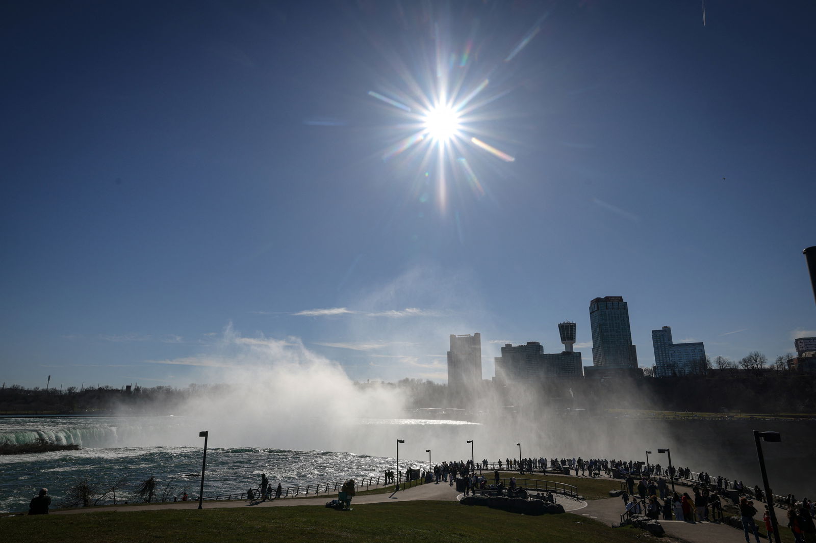 Tourists look at the Horseshoe Falls, ahead of the Solar Eclipse that will take place across parts of the United States and Canada on April 8, at Niagara Falls, New York, U.S., April 7, 2024. 