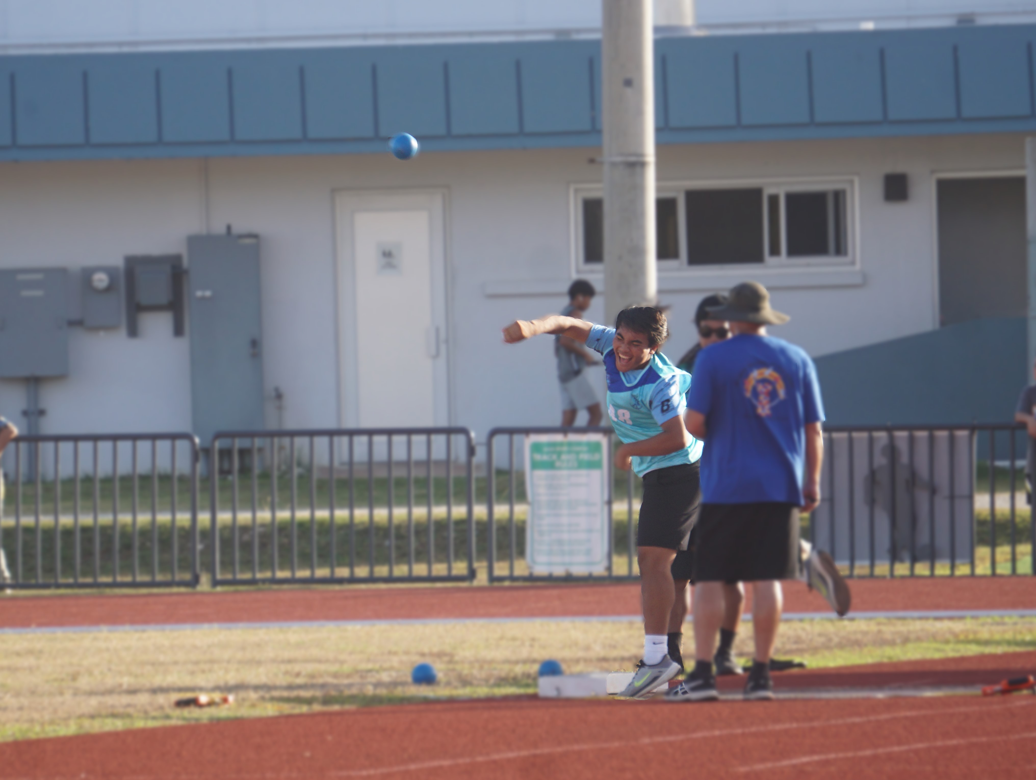 A Saipan International School student makes one of three attempts in the U18 shotput event during the first day of the PSS All School  Athletics at the Oleai Sports Complex on Wednesday.