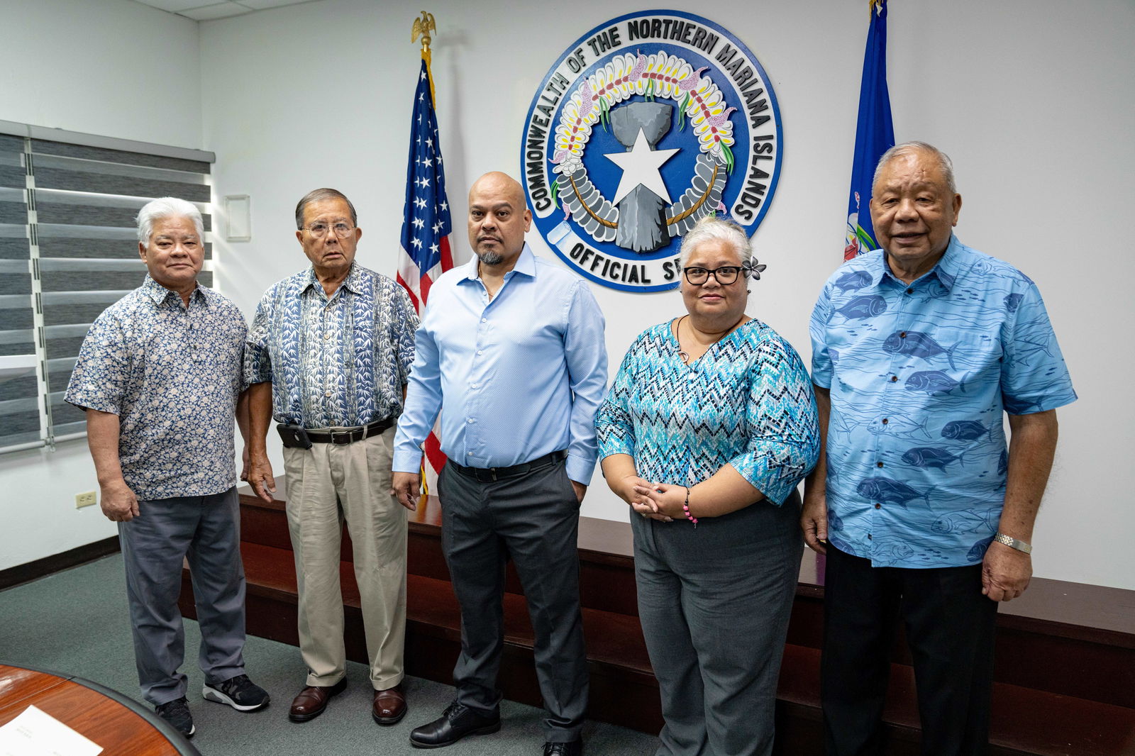 Gov. Arnold I. Palacios, left, and Lt. Gov. David M. Apatang, right, with new Marianas Public Land Trust board member Pete Q. Dela Cruz, second left, Commonwealth Cannabis Commission member Joseph S. Rios Jr., center, and Resident Executive for Indigenous Affairs Luella Marciano.