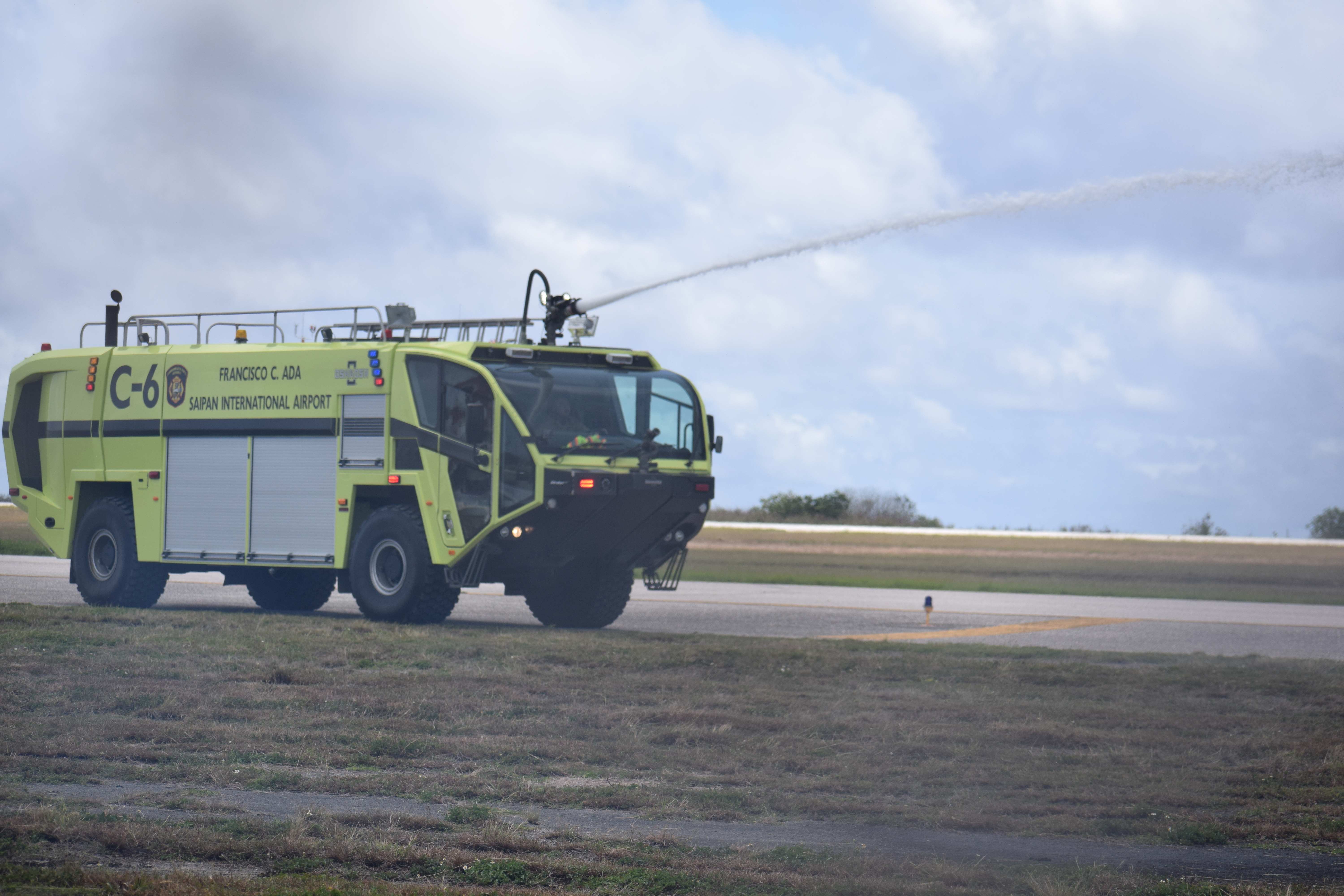 An Aircraft Rescue and Fire Fighting truck arrives at the “crash site.”