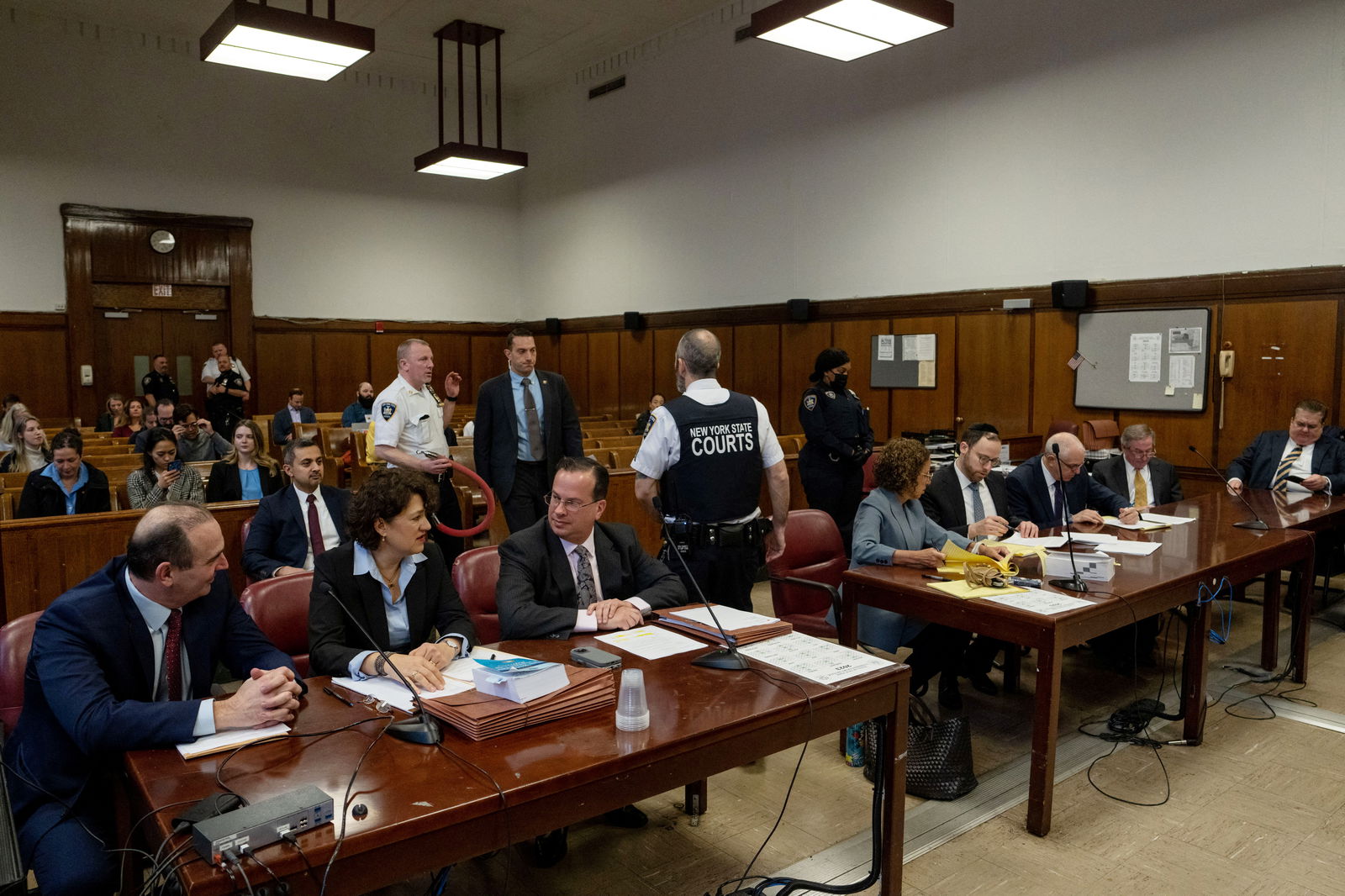 Prosecutors and Trump Organization lawyers gather at the Manhattan Criminal Courthouse for the sentencing hearing in New York City, U.S. January 13, 2023. 