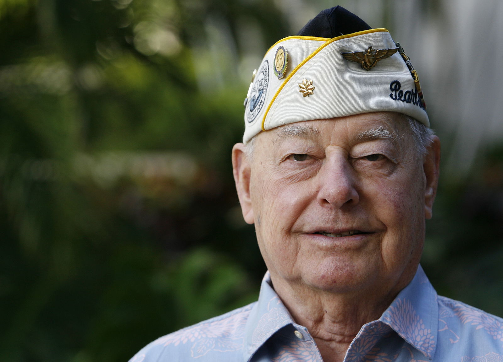 Pearl Harbor survivor Louis Conter poses for the camera at the Hale Koa hotel in Honolulu, Hawaii December 4, 2010. 