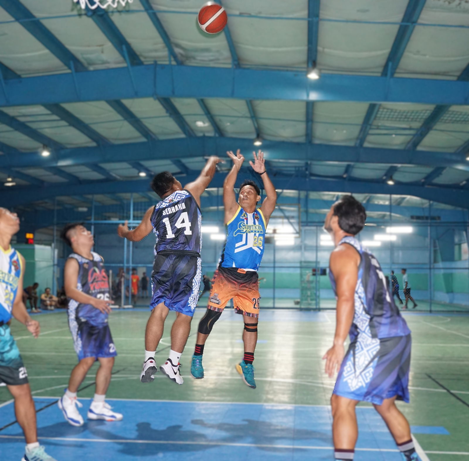 Savemore's Joel Saplan pulls up for the midrange jumper during a game against Yuman in the Legends Sports Association Invitational Basketball League season 2 at the TSL Sports Complex.