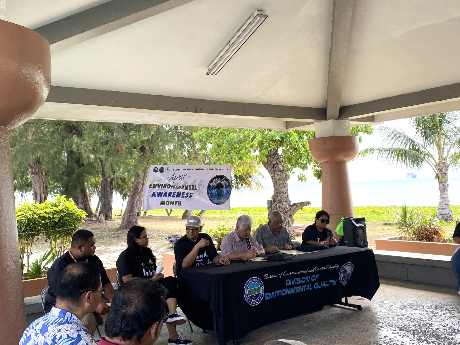Seated at the table are Bureau of Environmental & Coastal Quality Administrator Eli Cabrera, Gov. Arnold I. Palacios, Lt. Gov. David M. Apatang and Division of Environmental Quality Director Zabrina S. Cruz during the proclamation singing ceremony for Environmental Awareness Month on Monday.