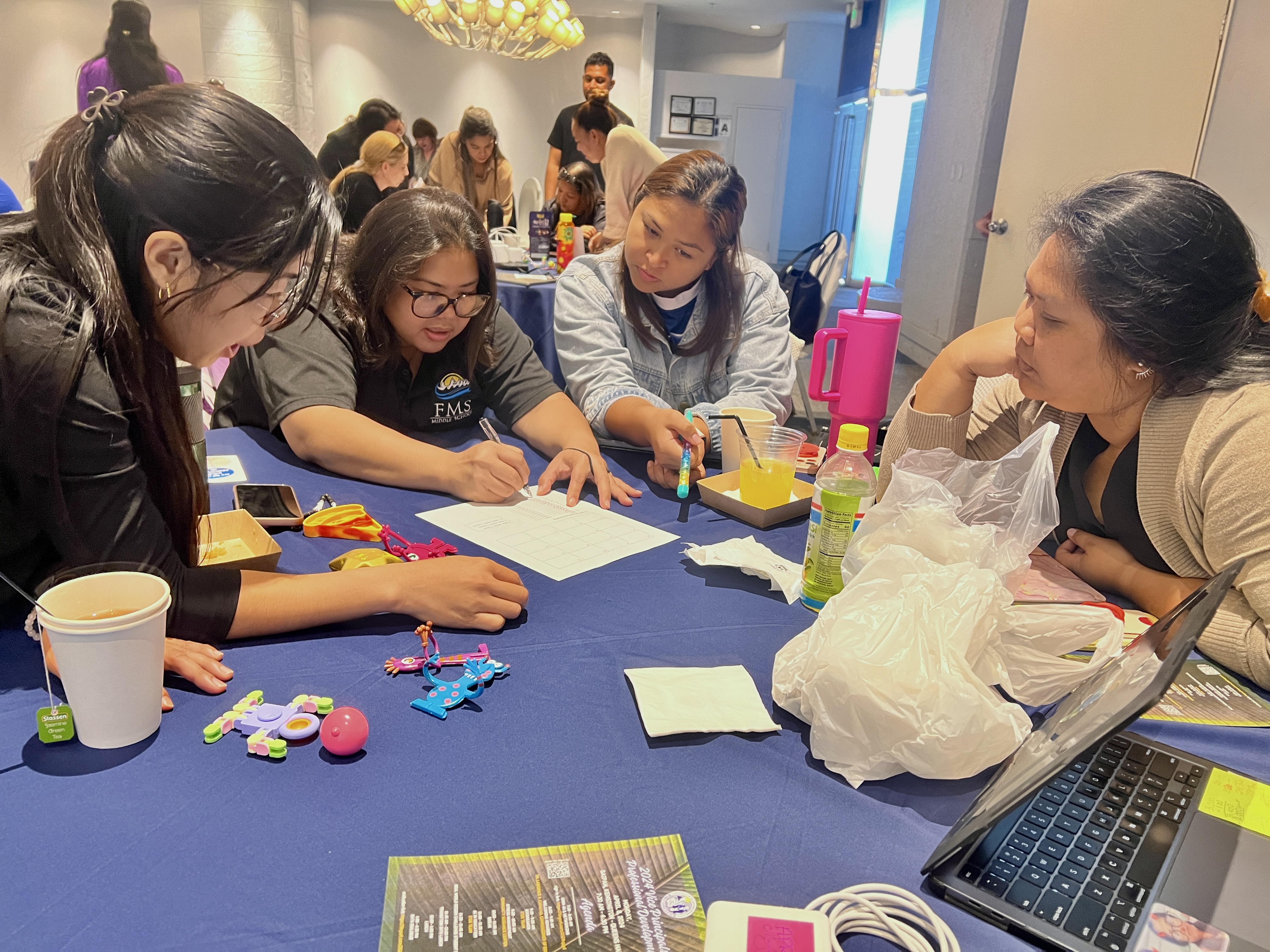 Vice Principals April Manglona, Catherine Cabrera, Jaclyn Rose Quitugua and Juana Atalig take part in a professional development activity.