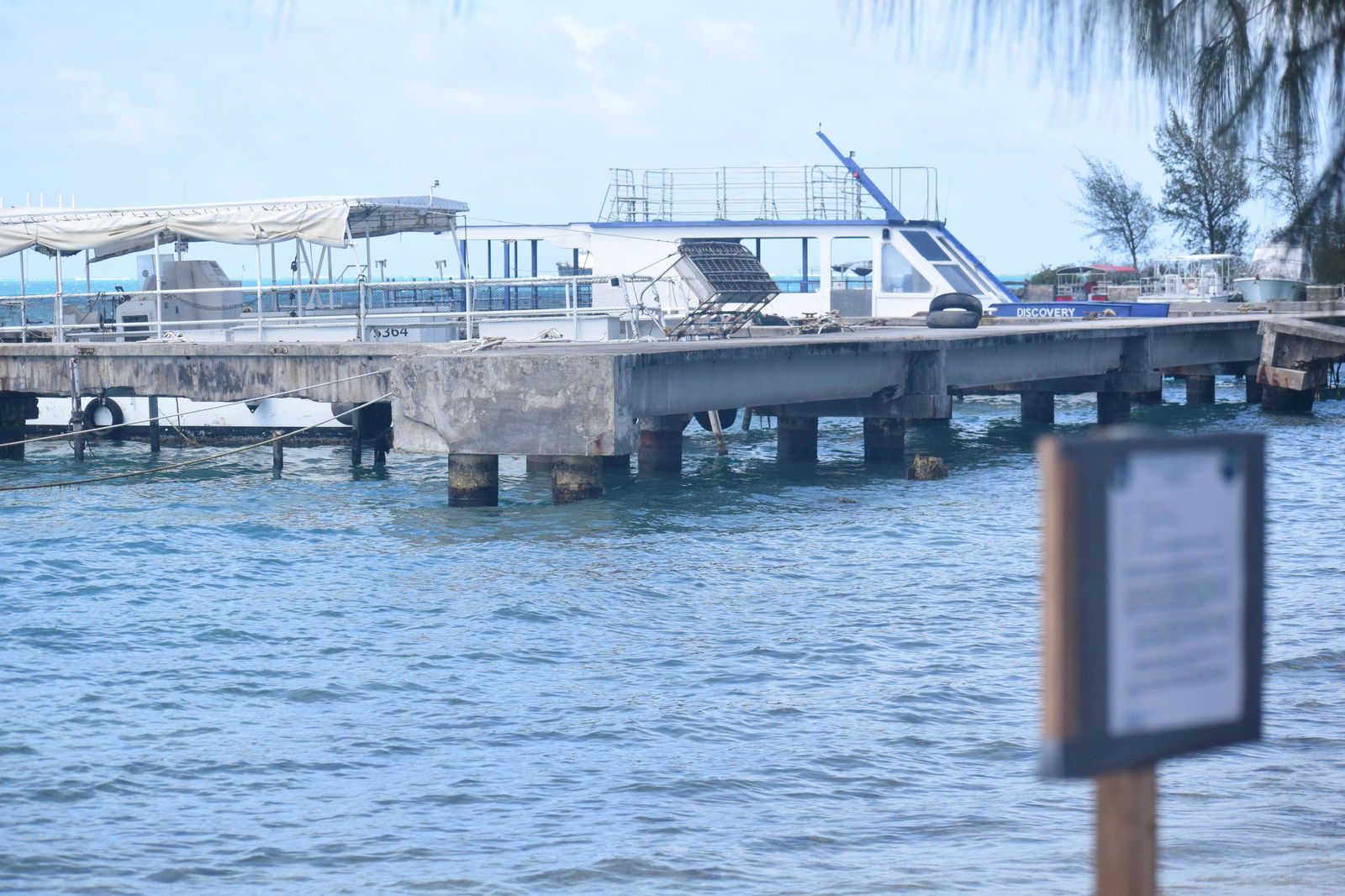 A Department of Lands and Natural Resource's notice is posted at one of the docks at Outer Cove Marina.