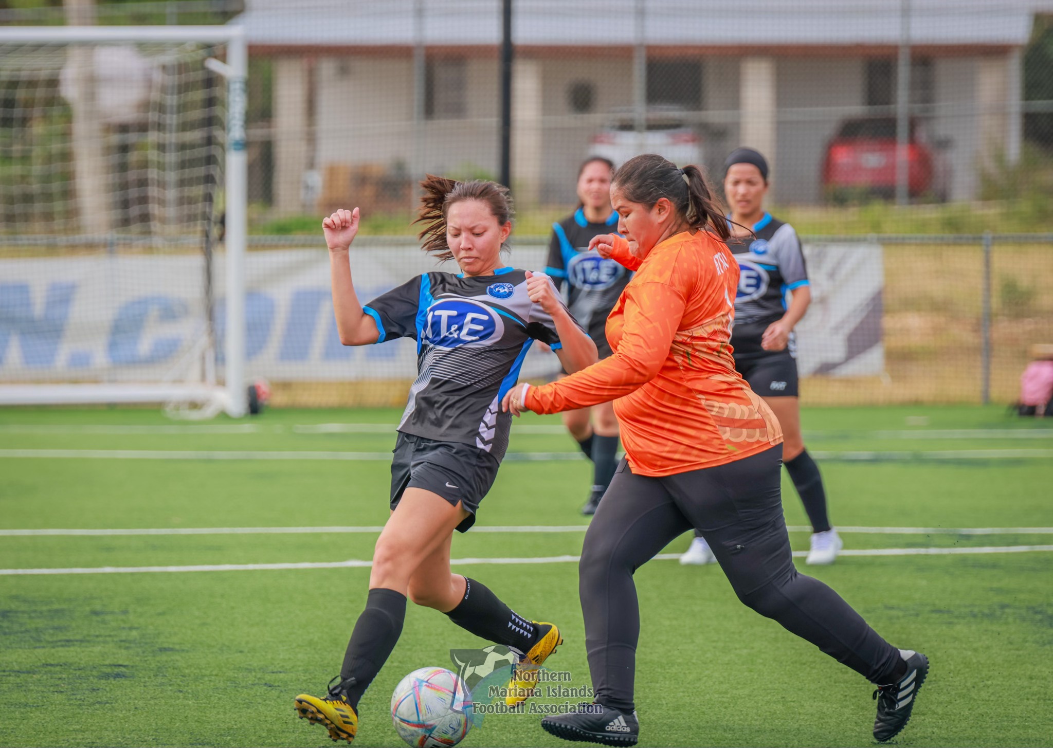 MPU Pink's Loriann Rabe extends to secure the possession during a game against Kanoa in the Flores Pee-Luwal (intermediate) division of the Spring 2024 Dove Women’s League at the NMI Soccer Training Center in Koblerville.
