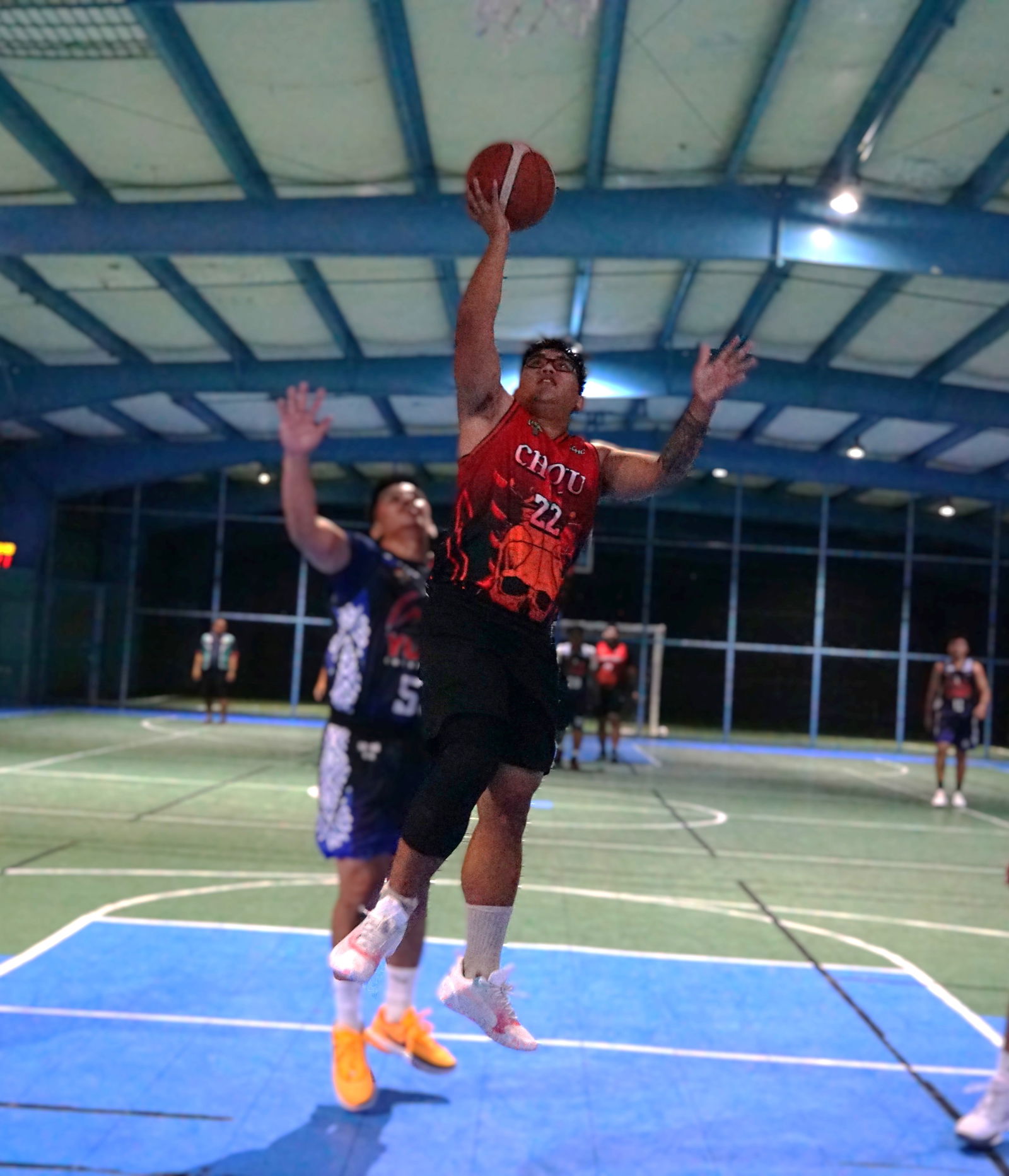 Choju's Henry Aguon takes the open shot during a semifinals game against Yuman in season 2 of the Legends Sports Association Invitational Basketball League at the TSL Sports Complex on Tuesday.