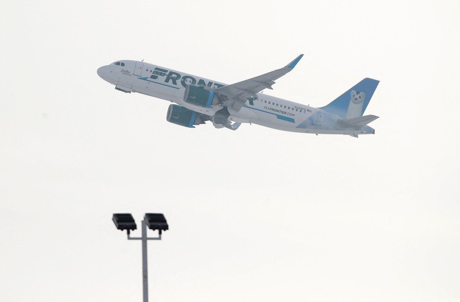 FILE PHOTO: A Frontier Airlines Airbus A320neo plane departs from O'Hare International Airport in Chicago, Illinois, U.S. November 30, 2018. 