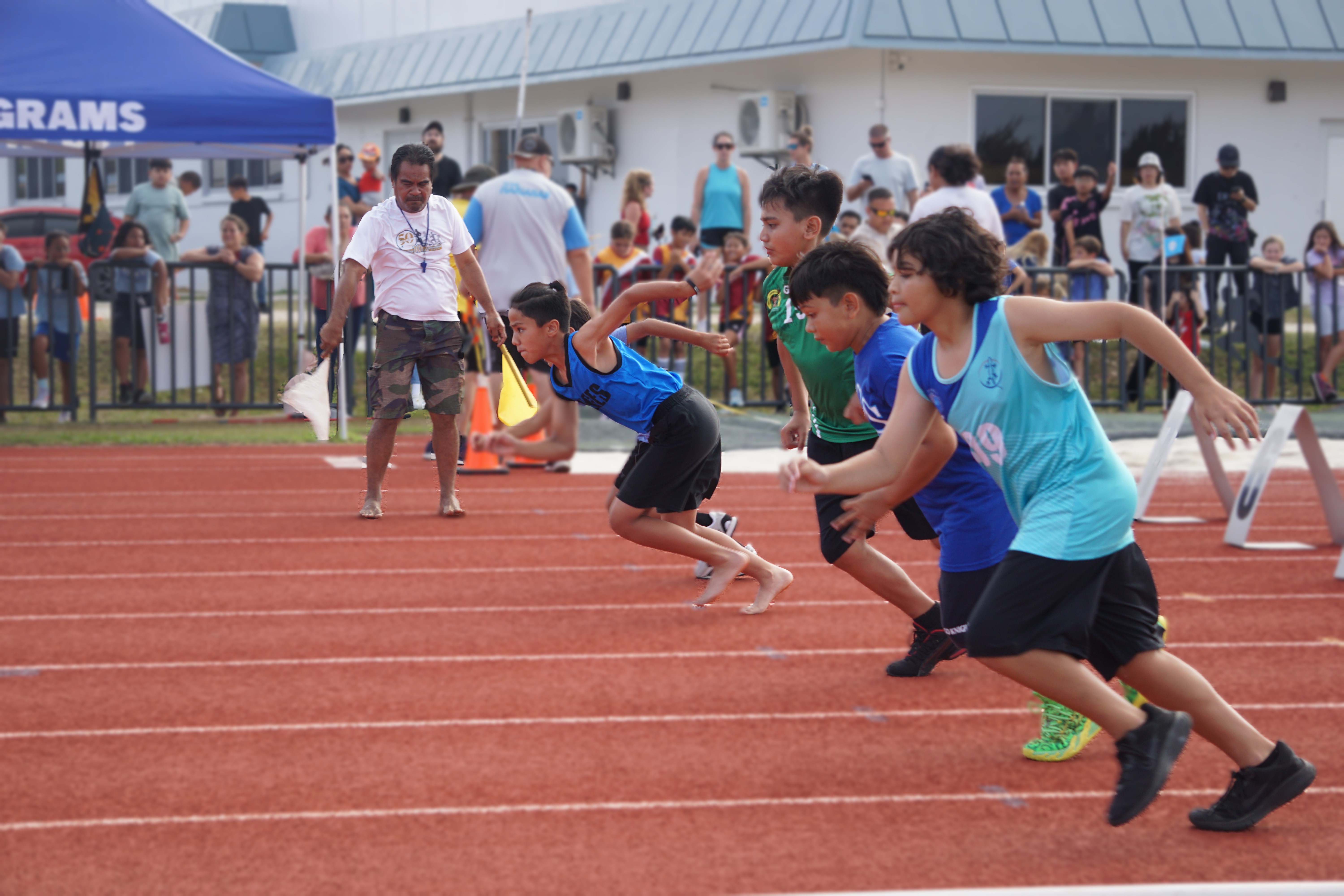 Students take off in the U9 boys 60m sprint event of the PSS All School Track & Field (Athletics) SY23-24 at the Oleai Sports Complex on Thursday.
