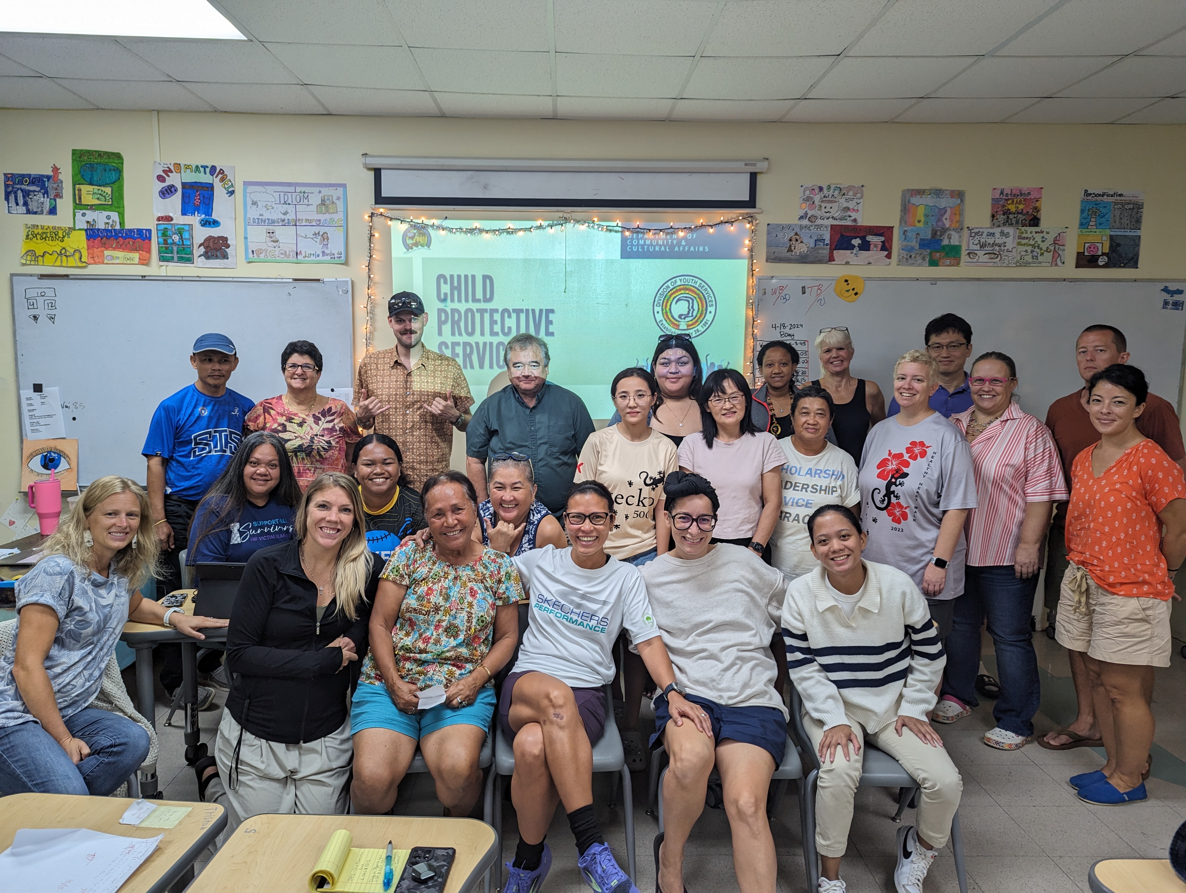 Staff at SIS with DYS trainers.