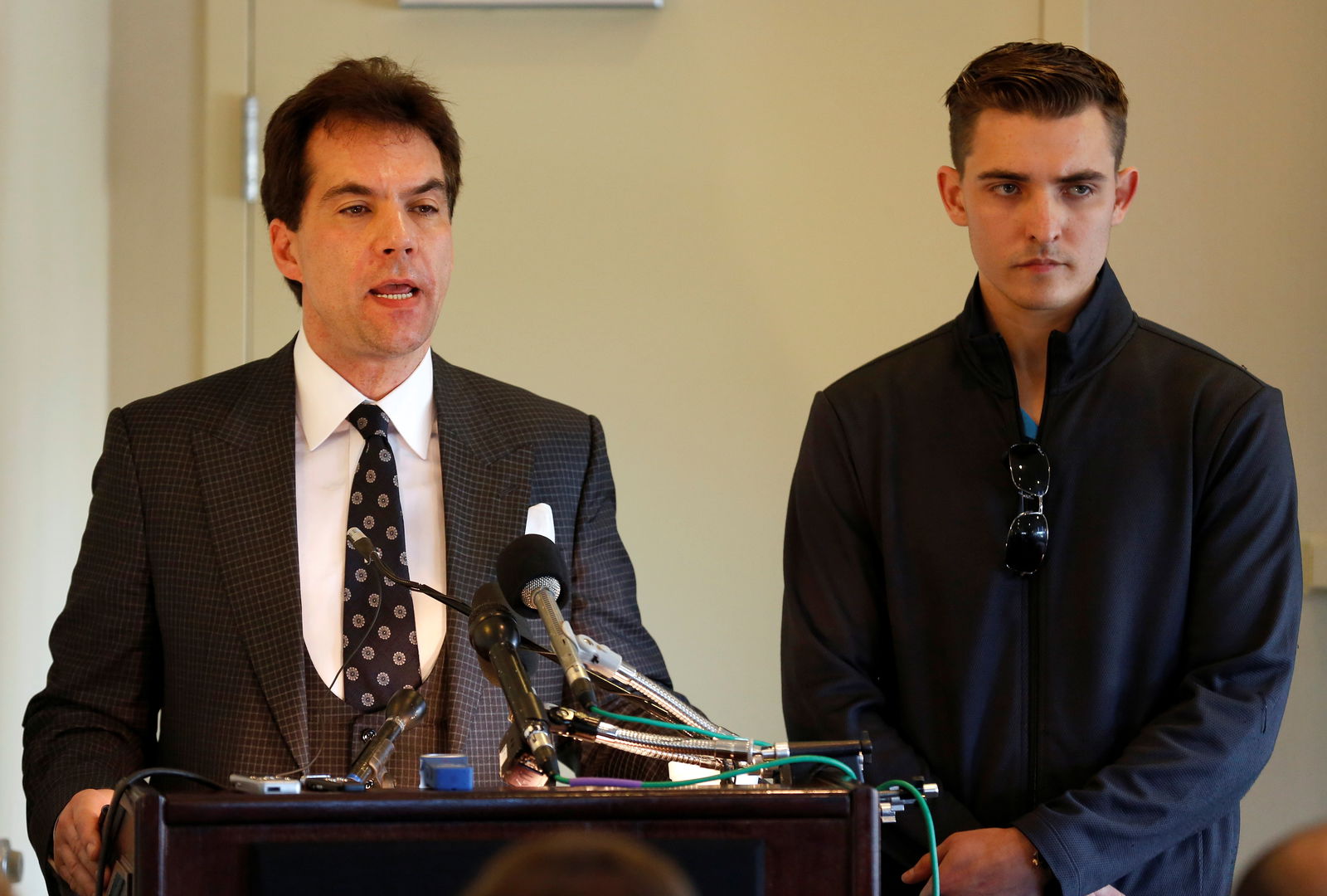FILE PHOTO: Jack Burkman, a lawyer and Republican political operative, and Jacob Wohl (R), an internet political activist and supporter of President Donald Trump, speak during a news conference to address their allegations against Special Counsel Robert Mueller in Arlington, Virginia, U.S., November 1, 2018. 
