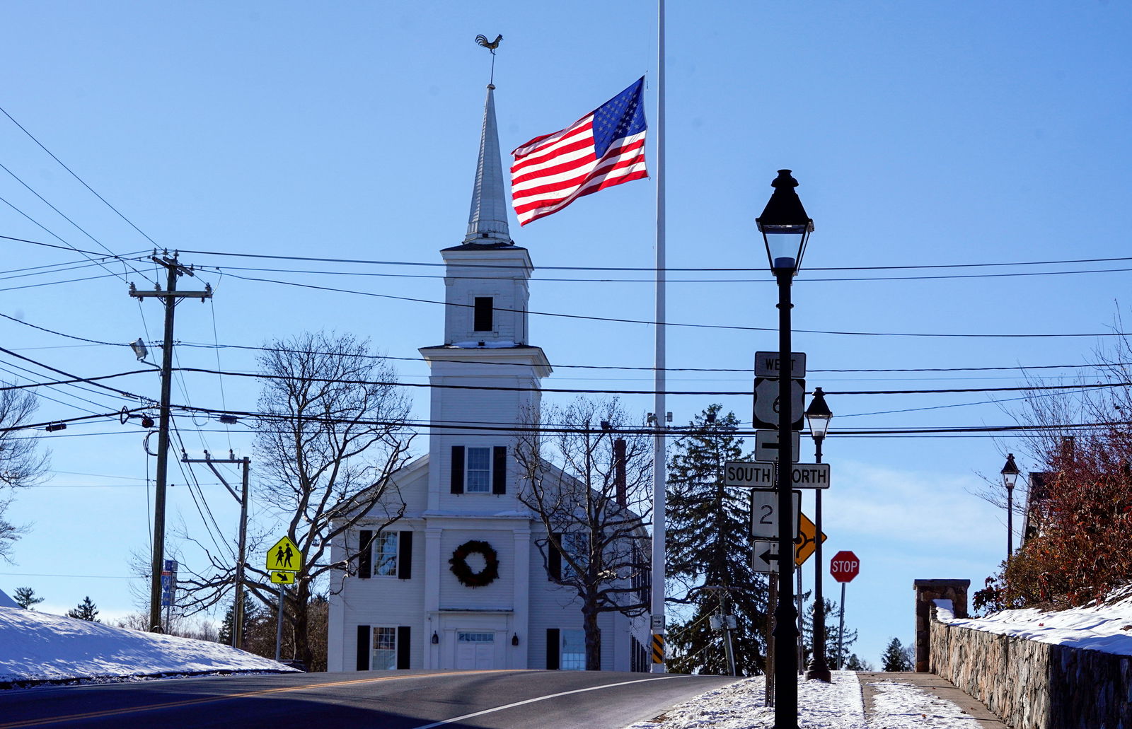The flag on Main St flies at half-staff to mark the 10th anniversary of the shooting at Sandy Hook Elementary School in Newtown, Connecticut, U.S., December 14, 2022. 