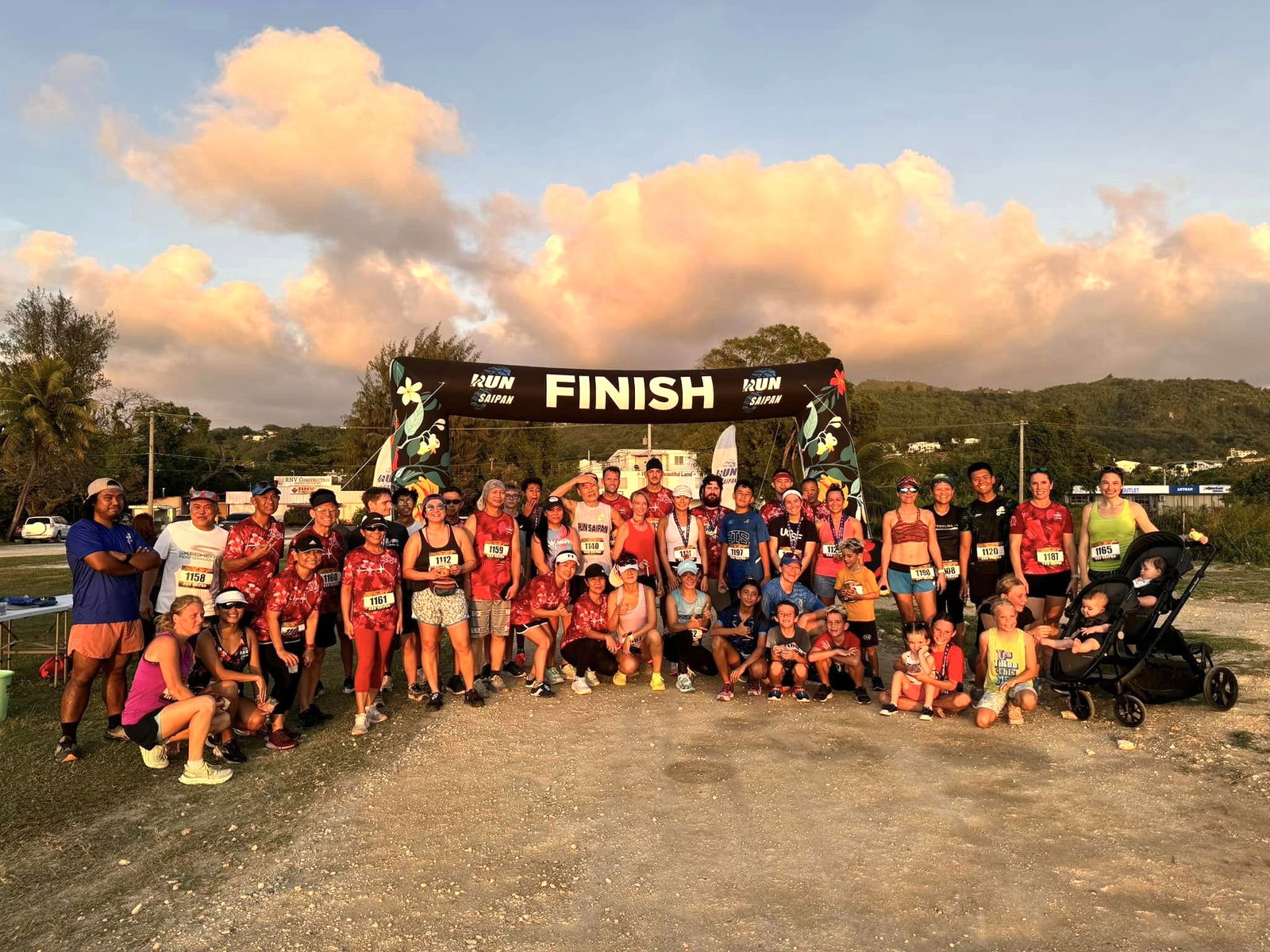 Participants pose for a group photo after completing the third annual Happy Hearts 5K Fun Run & Walk sponsored by the Commonwealth. Healthcare Corporation and its Sunshine Squad at the Garapan Fishing Base on Friday afternoon.