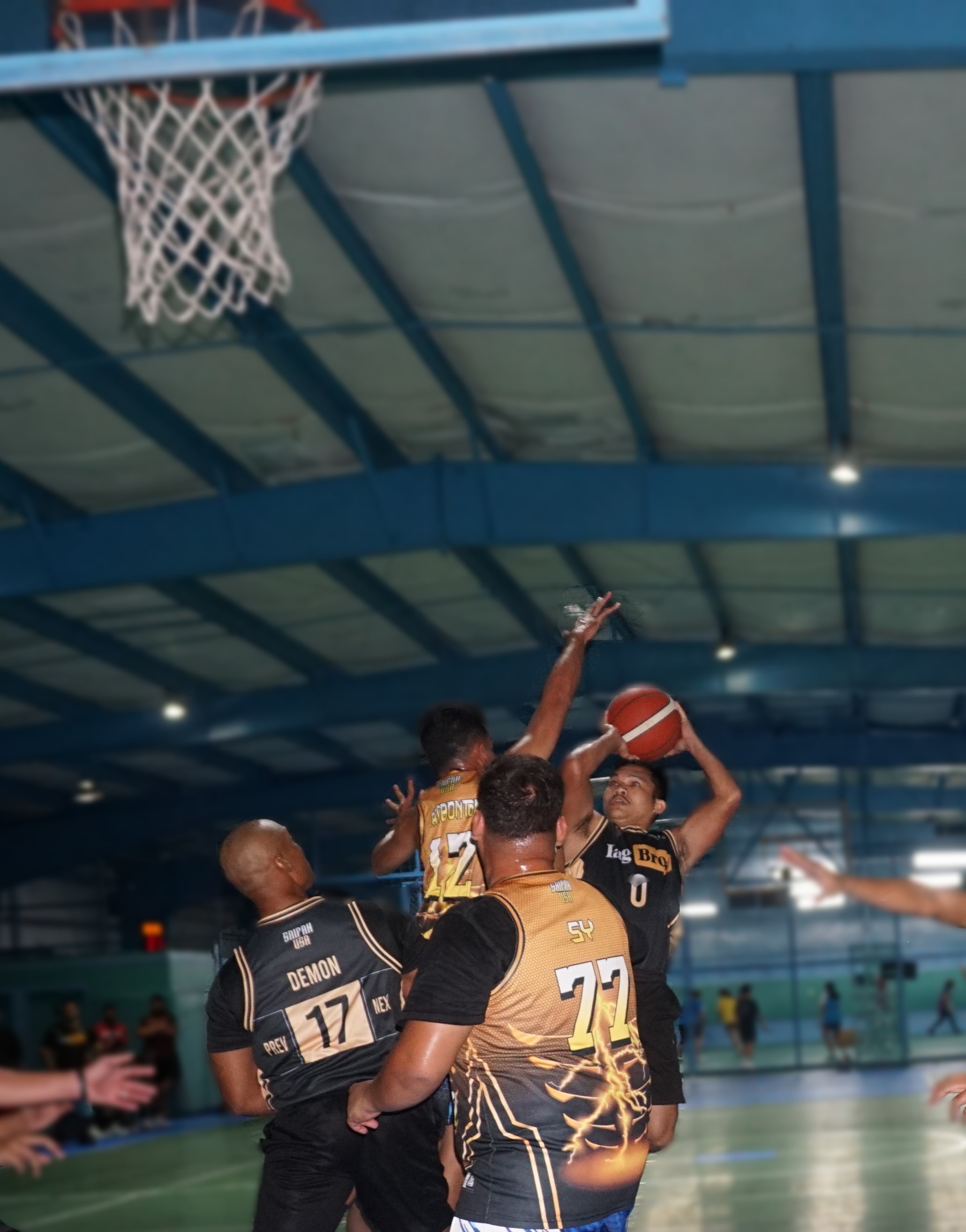 Kagbros’ Zach Babauta takes the contested fadeaway shot during a game against Elite Force in season 2 of the Legends Sports Association Invitational Basketball League at the TSL Sports Complex.