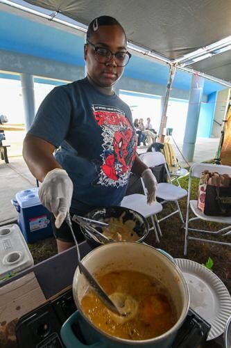 Guam Community College Education Student Organization member Keiana Santos makes fried Oreos during the Spring Festival on Thursday, March 4, 2024, in Mangilao. 