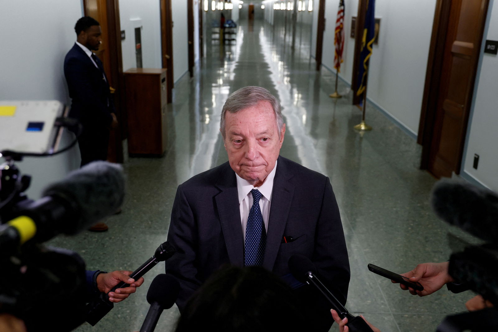FILE PHOTO: U.S. Senate Judiciary Committee Chairman Dick Durbin (D-IL) speaks to reporters outside a hearing on federal judge nominations on Capitol Hill in Washington, U.S. October 4, 2023. 