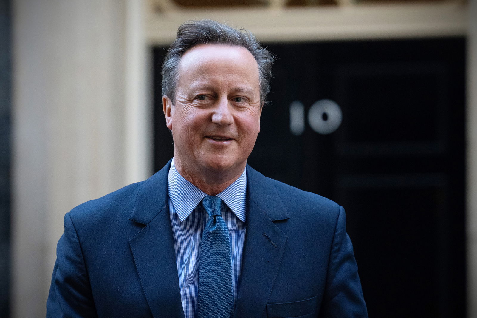 Britain's former Prime Minister, David Cameron, leaves 10, Downing Street after being appointed Foreign Secretary in a Cabinet reshuffle on Nov. 13, 2023, in London. The U.K.'s support for Israel in the Gaza war is not unconditional, Cameron has suggested in 2024.(Carl Court/Getty Images/TNS)