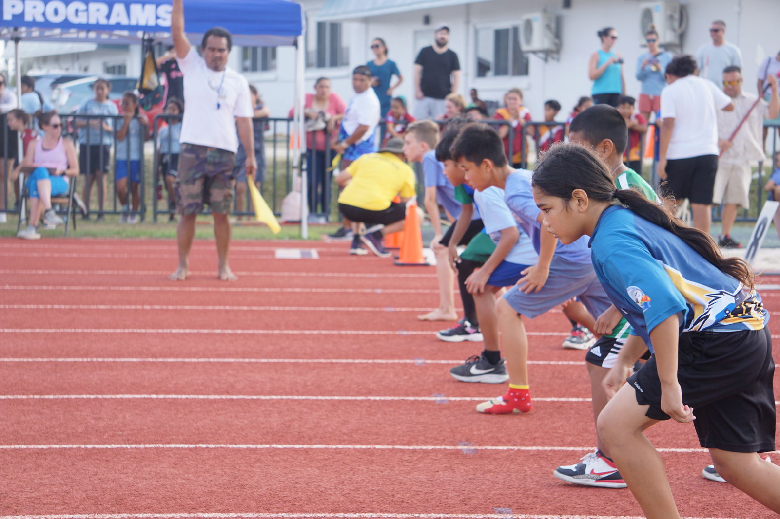 Runners of participating schools prepare to take off during a sprint event in the elementary school division of the PSS All School Track & Field (Athletics) SY 23-24 at the Olea Sports Complex.
