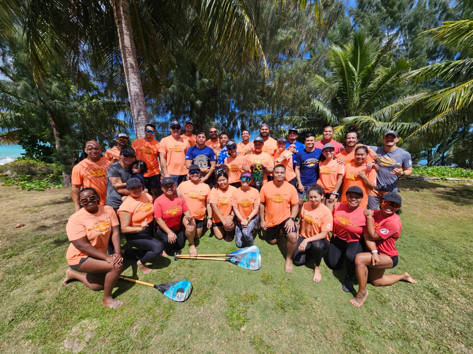 Marianas Outrigger Club members pose for a group picture.