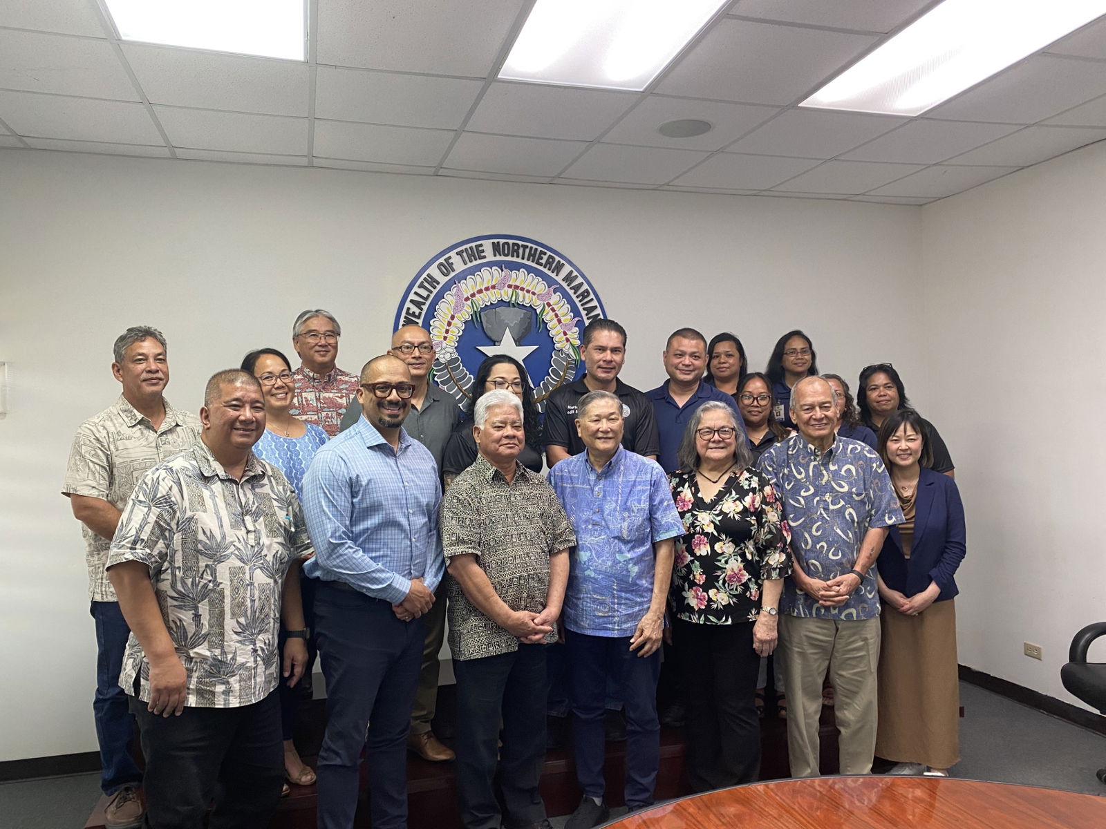 Gov. Arnold I. Palacios and U.S. Congressman Gregorio Kilili Camacho Sablan join U.S. Department of Agriculture and Northern Marianas Housing Corporation officials in a group photo.