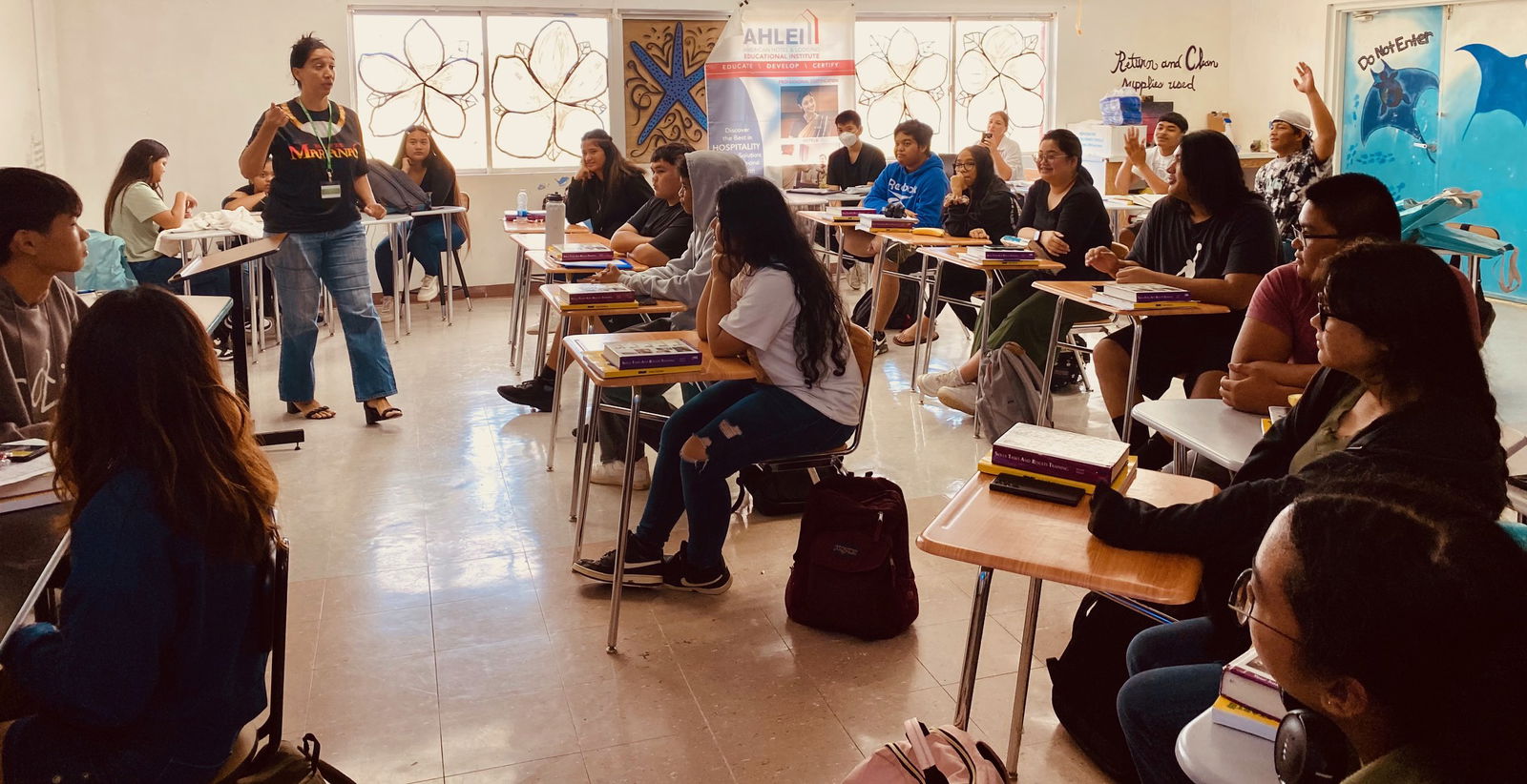Marianas Tourism Education Council Board Member Catherine Perry engages the Hospitality & Tourism Class of Saipan Southern High School during the educational outreach presentation of MTEC and the Marianas Visitors Authority on April 11, 2024, at the school in Koblerville, Saipan.