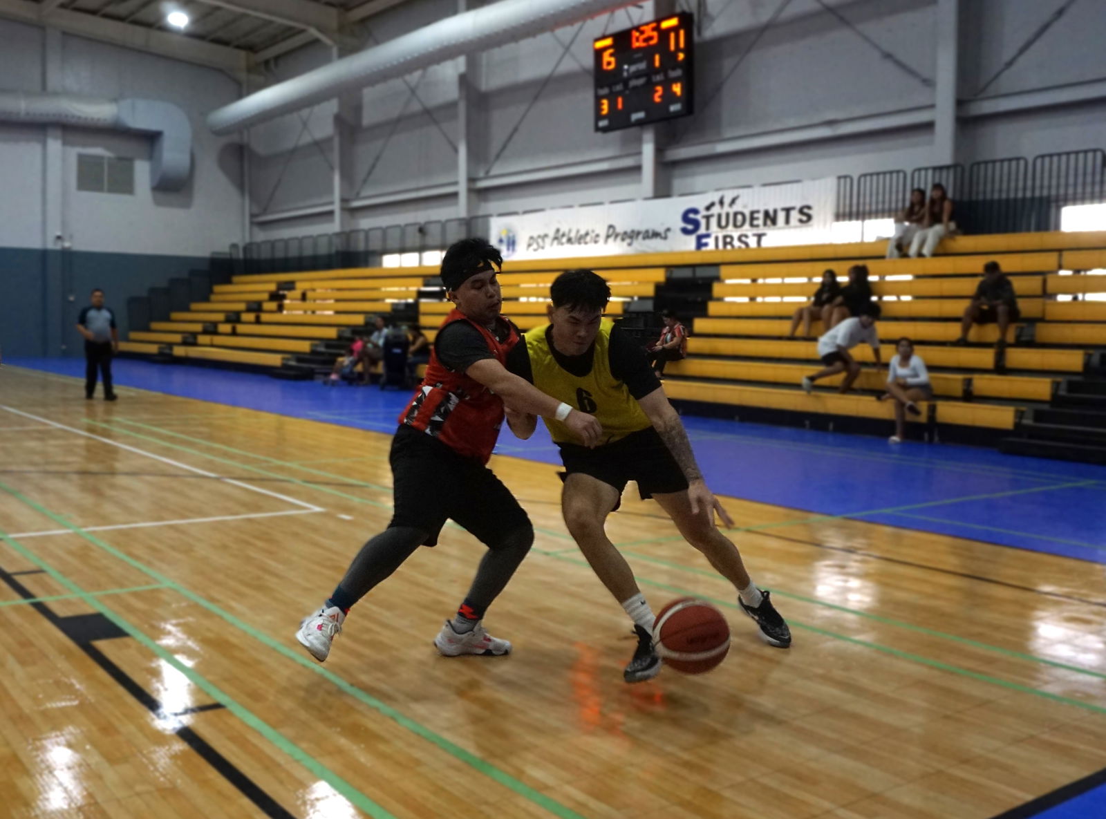 Bridge Capital's Tony Kim attempts the drive as 670 Akkari-Eet 1's John Paul Cruz reaches for the steal during a men's open division game of Michelob Ultra Cup 2024 at the Ada gym on Saturday.