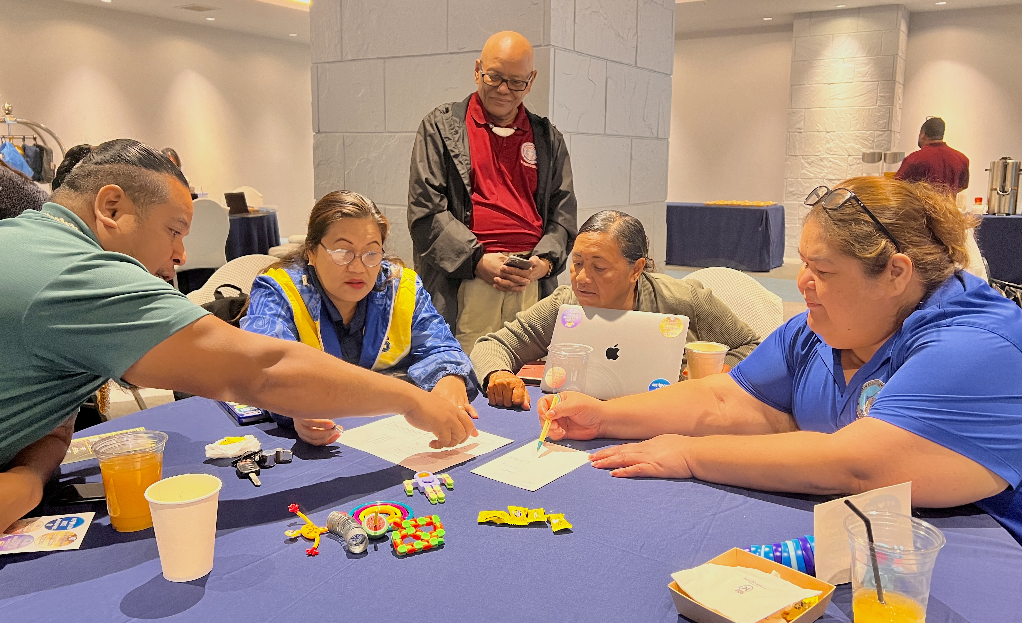 From left, Hopwood Middle School Vice Principals Dr. Ben Seman and Karen A. Manuel, Board of Education Chairman Herman Atalig, Tanapag Middle School Vice Principal Feliza Tellu and Kagman Elementary School Vice Principal Loling Camacho.