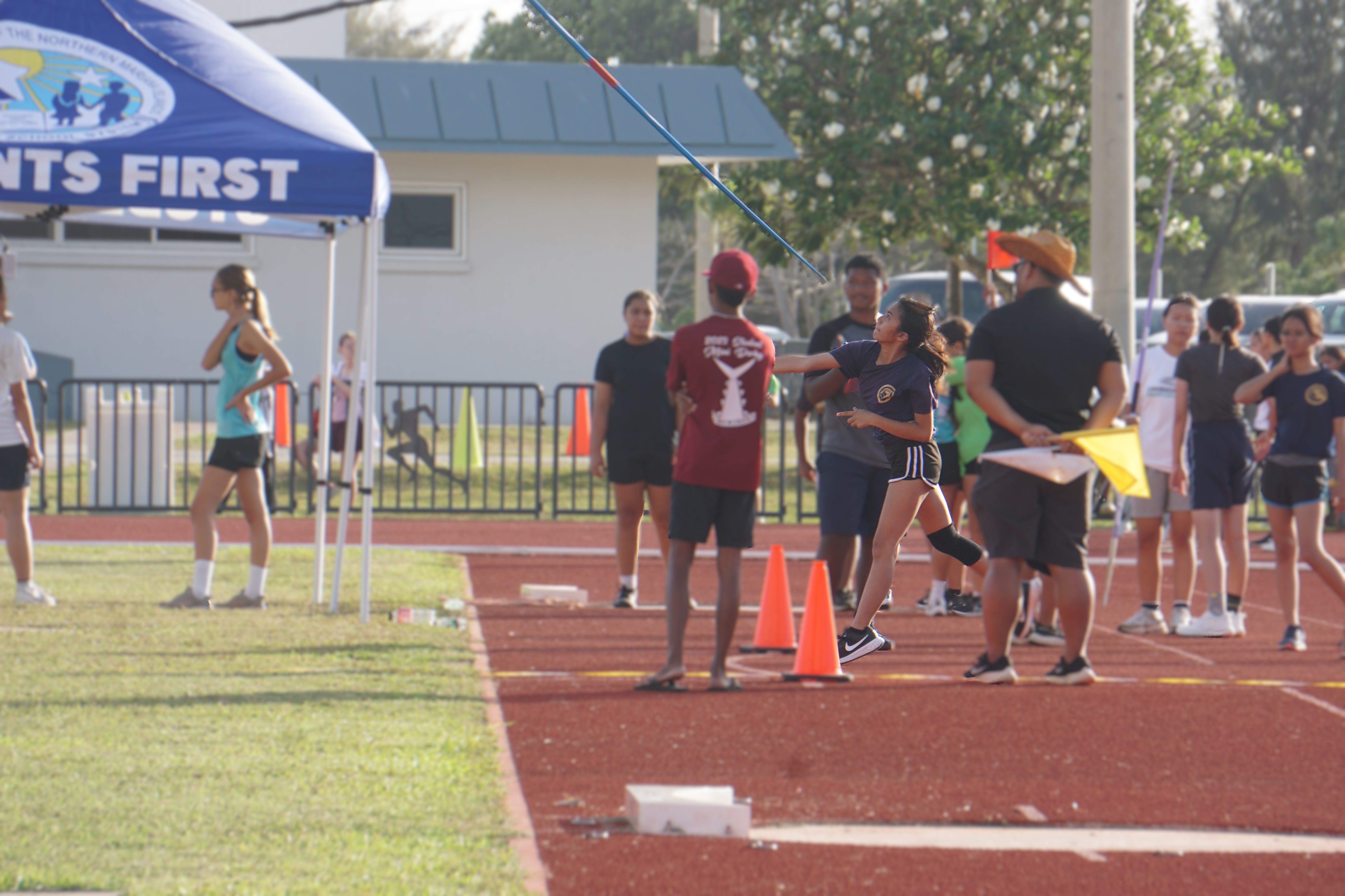A Hopwood Middle School student throws the javelin during the U14 girls javelin throw event of the PSS All School Track & Field (Athletics) SY23-24 at the Oleai Sports Complex on Friday.