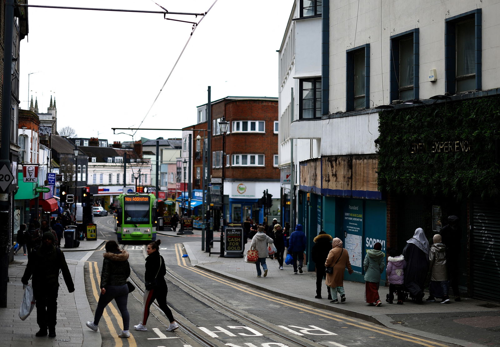 FILE PHOTO: People walk along a high street in Croydon, south London, Britain, February 26, 2024. 