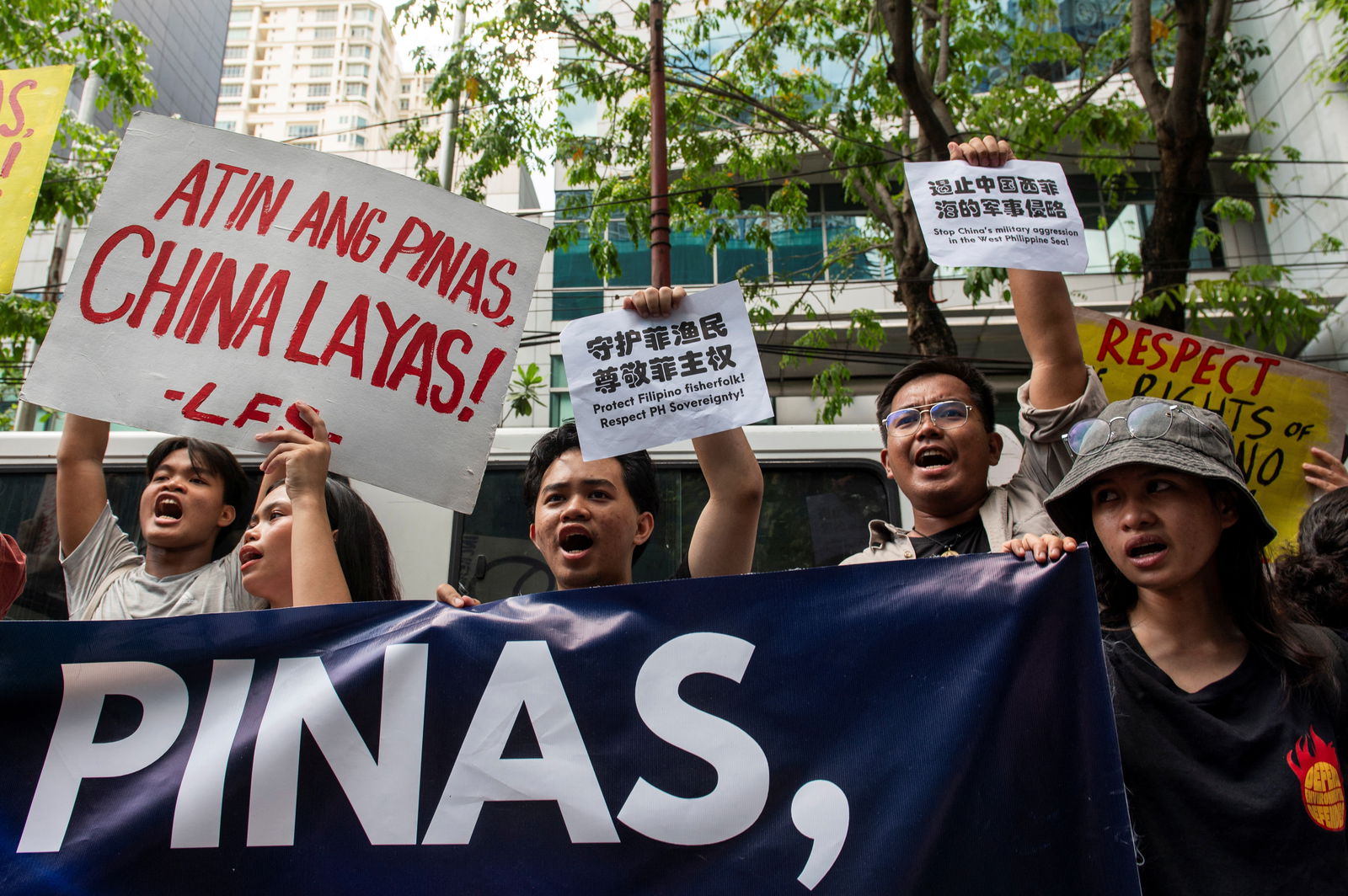 Filipino activists hold a protest condemning China's actions during an encounter in the disputed waters of the South China Sea, outside of the Chinese Consulate in Makati City, Metro Manila, Philippines, April 9, 2024. 