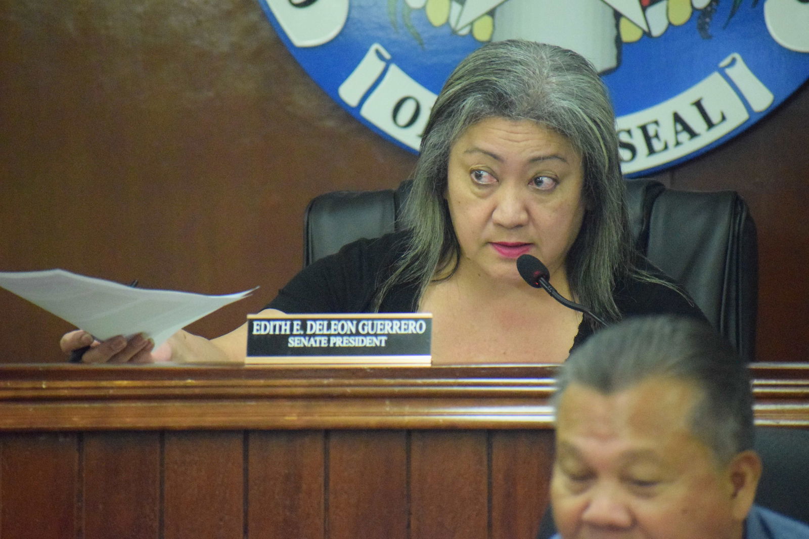 Senate President Edith Deleon Guerrero reacts while presiding over an emergency session on Wednesday.