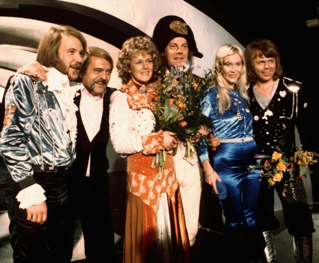 Members of the Swedish group ABBA and close associates celebrate the victory of their song “Waterloo” in the Eurovision Song Contest in Brighton, England, April 6, 1974.