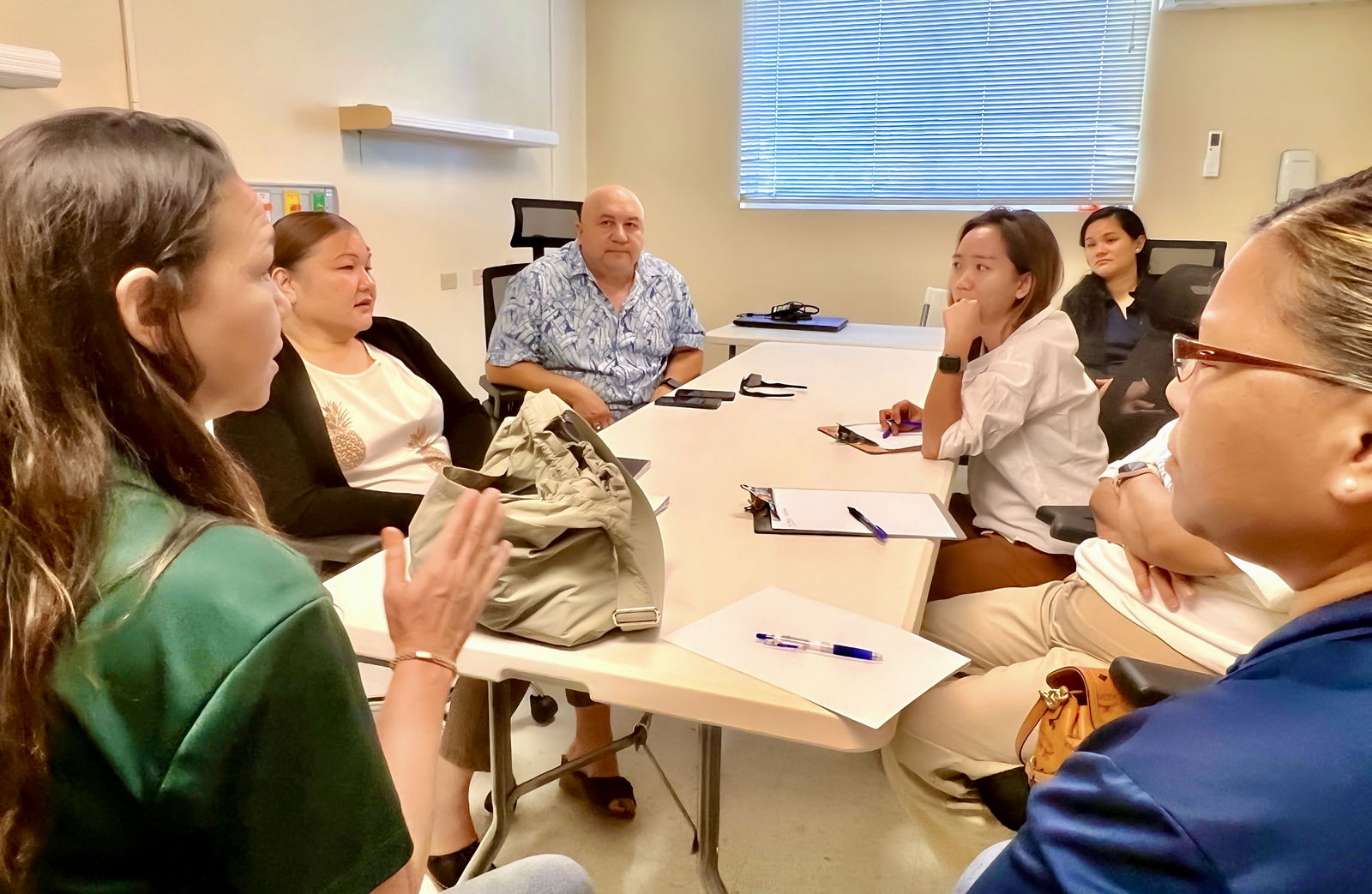 Early Intervention Program Director Robin L. Palacios, left, speaks during a meeting with Commonwealth Healthcare Corp./Rota Health Center Resident Director Vanessa Quitugua, second left, Commissioner of Education Dr. Lawrence F. Camacho, third left, and Rota Health Center personnel.