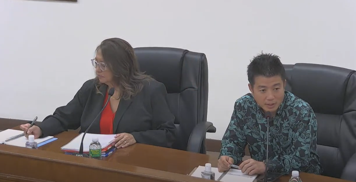 Brian Shin, right, the president and chief executive officer of E-Land Group’s Micronesian Resort Inc., and Gloria Cavanagh, the acting vice president of E-Land, attend a meeting with the Senate Committee on Resources, Economic Development, Programs & Gaming and the Department of Public Lands in the Senate chamber on Friday.
