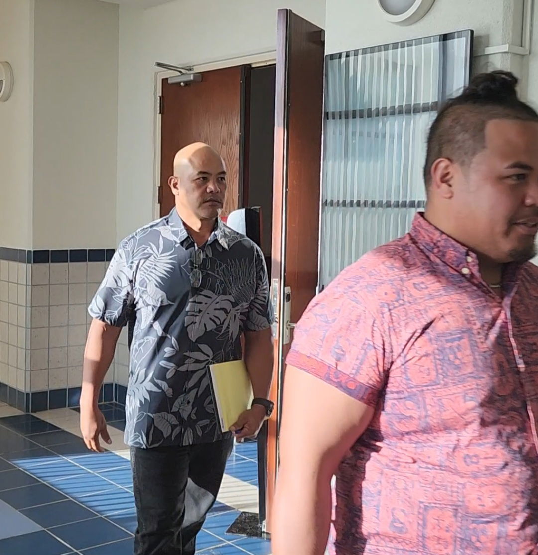 Chief of Parole Nick Masga Reyes leaves the courtroom after a hearing on Monday.