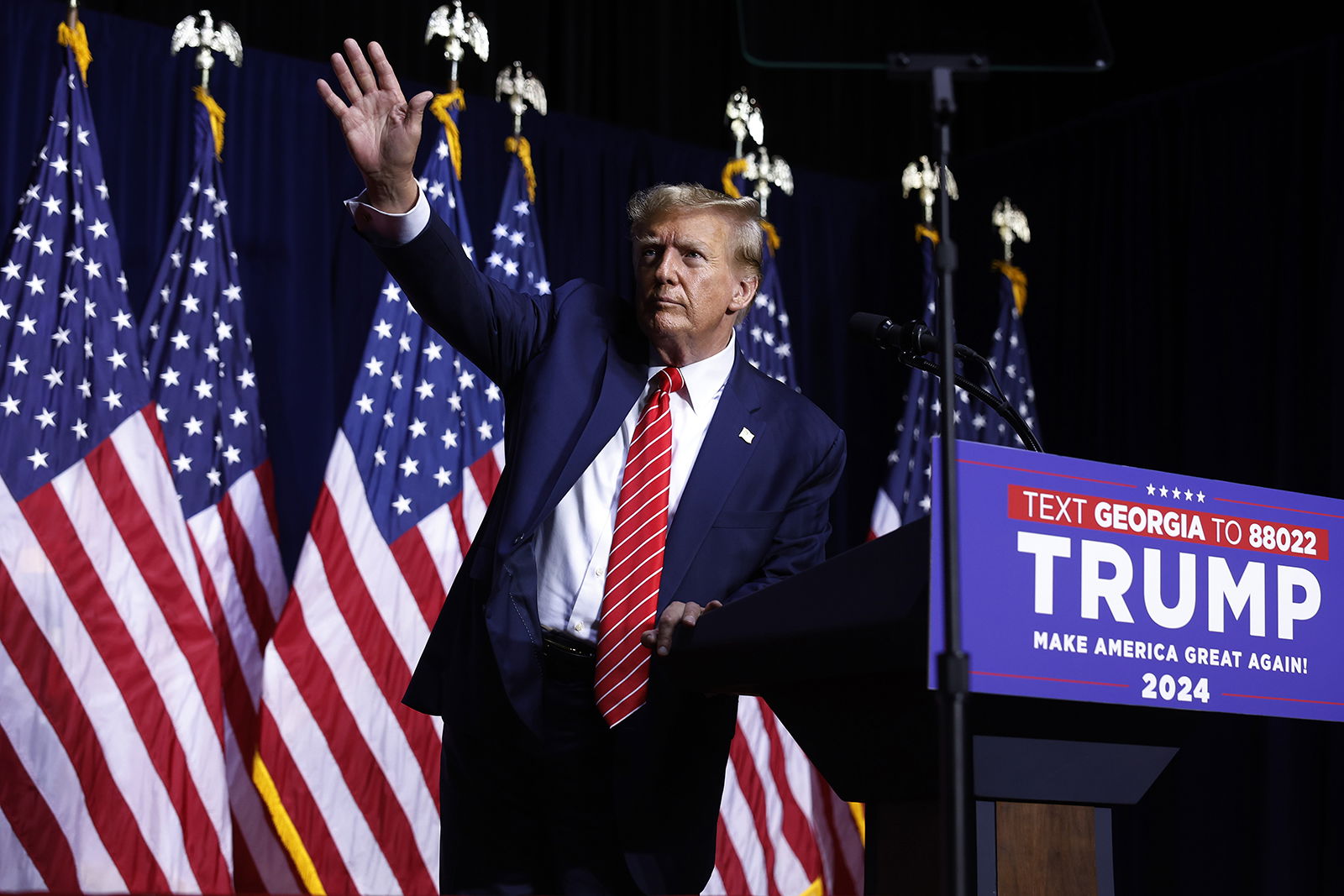 Republican presidential candidate and former U.S. President Donald Trump leaves the stage at the conclusion of a campaign rally at the Forum River Center on March 9, 2024, in Rome, Georgia. (Chip Somodevilla/Getty Images/TNS)