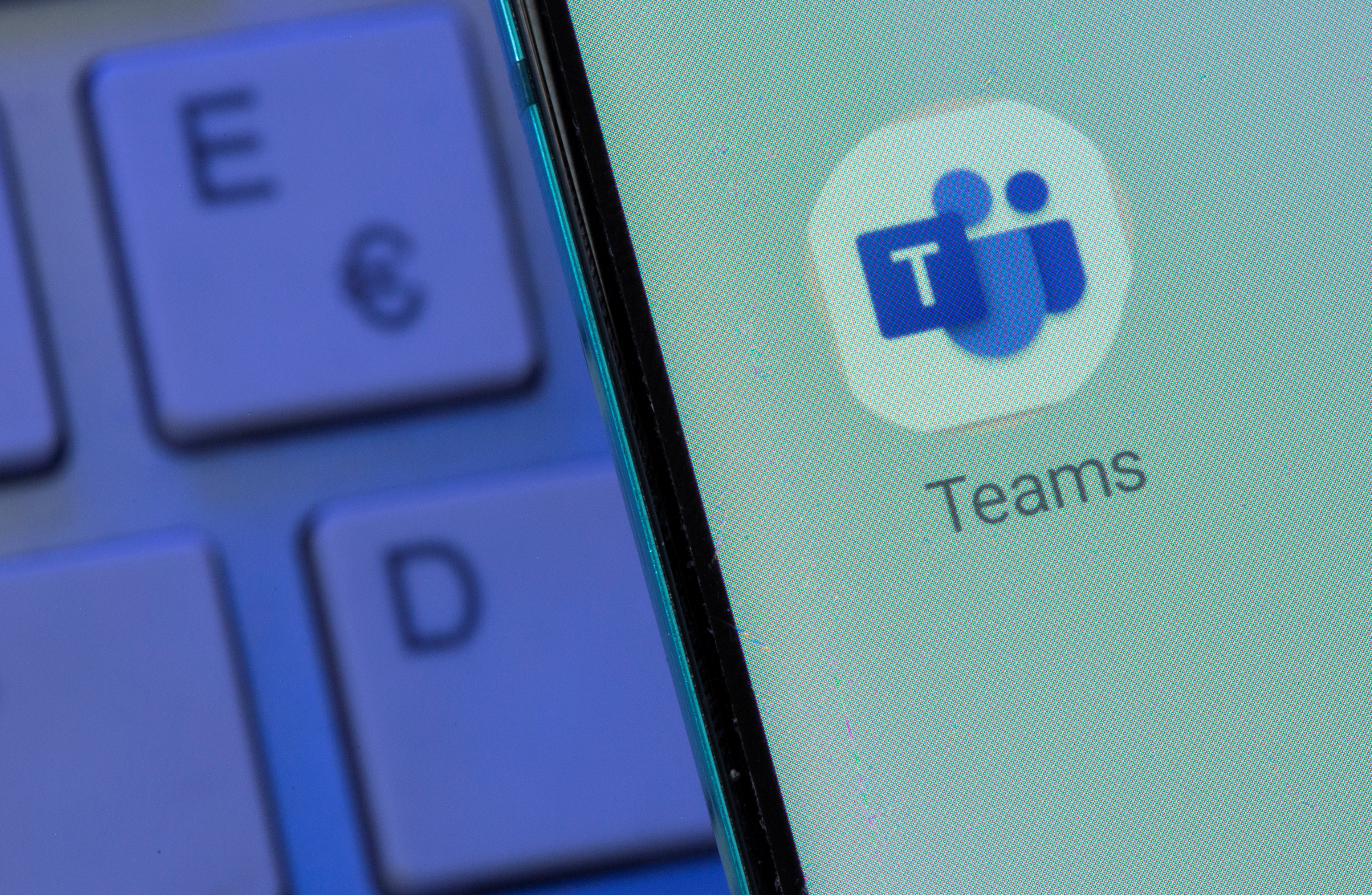 FILE PHOTO: Microsoft Teams app is seen on the smartphone placed on the keyboard in this illustration taken, July 26, 2021. 