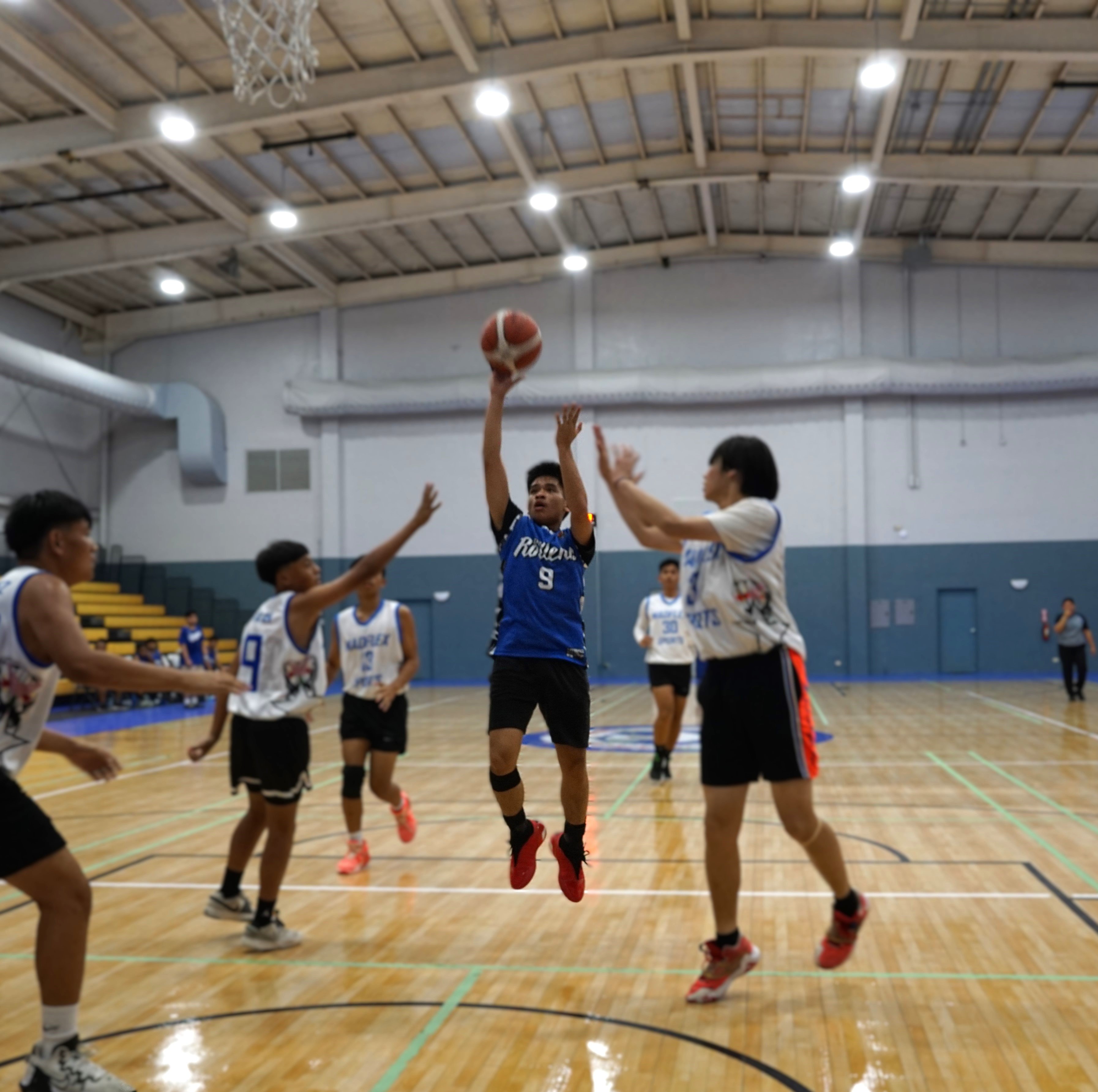 670 Rollers' Mikee Mercado Jr. goes up for the floater during a Pokka Cup game against Madflex at the Gilbert C. Ada gym on Sunday.