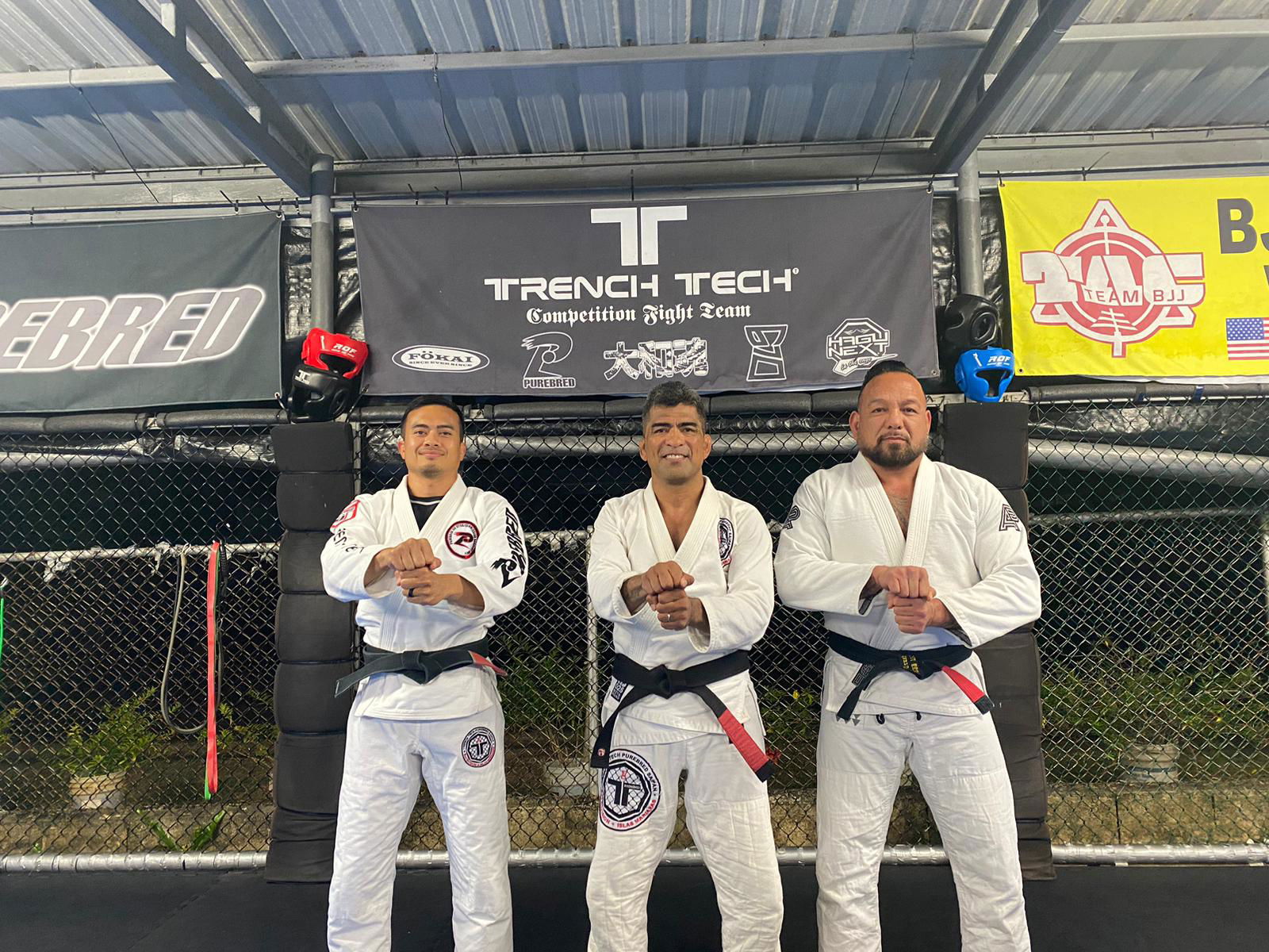 Trench Tech’s black belts Clinton Dela Cruz, Cuki Alvarez and Anthony Torres.