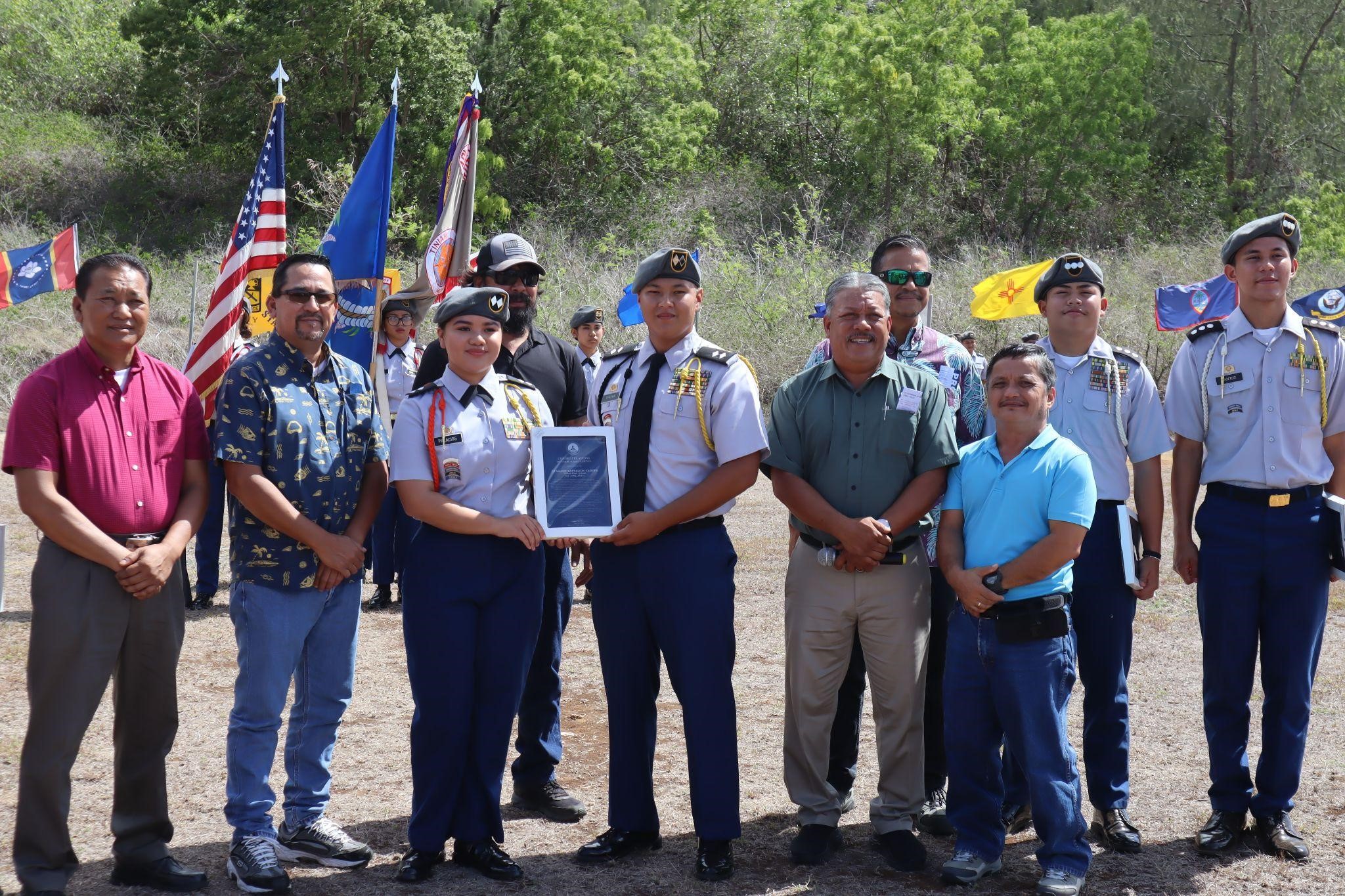 C/LTC Ysabella Palacios and C/LTC Edward Tirona receive the Stallion Battalion’s award dedicated to the achievements made this year with the Mayor Edwin Aldan and members of the Tinian delegation and municipal council.